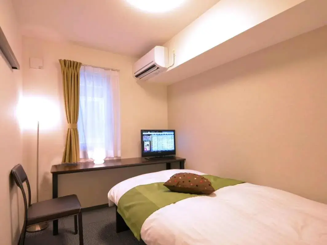 Bedroom, TV/Entertainment Center in Value The Hotel Sendai Natori