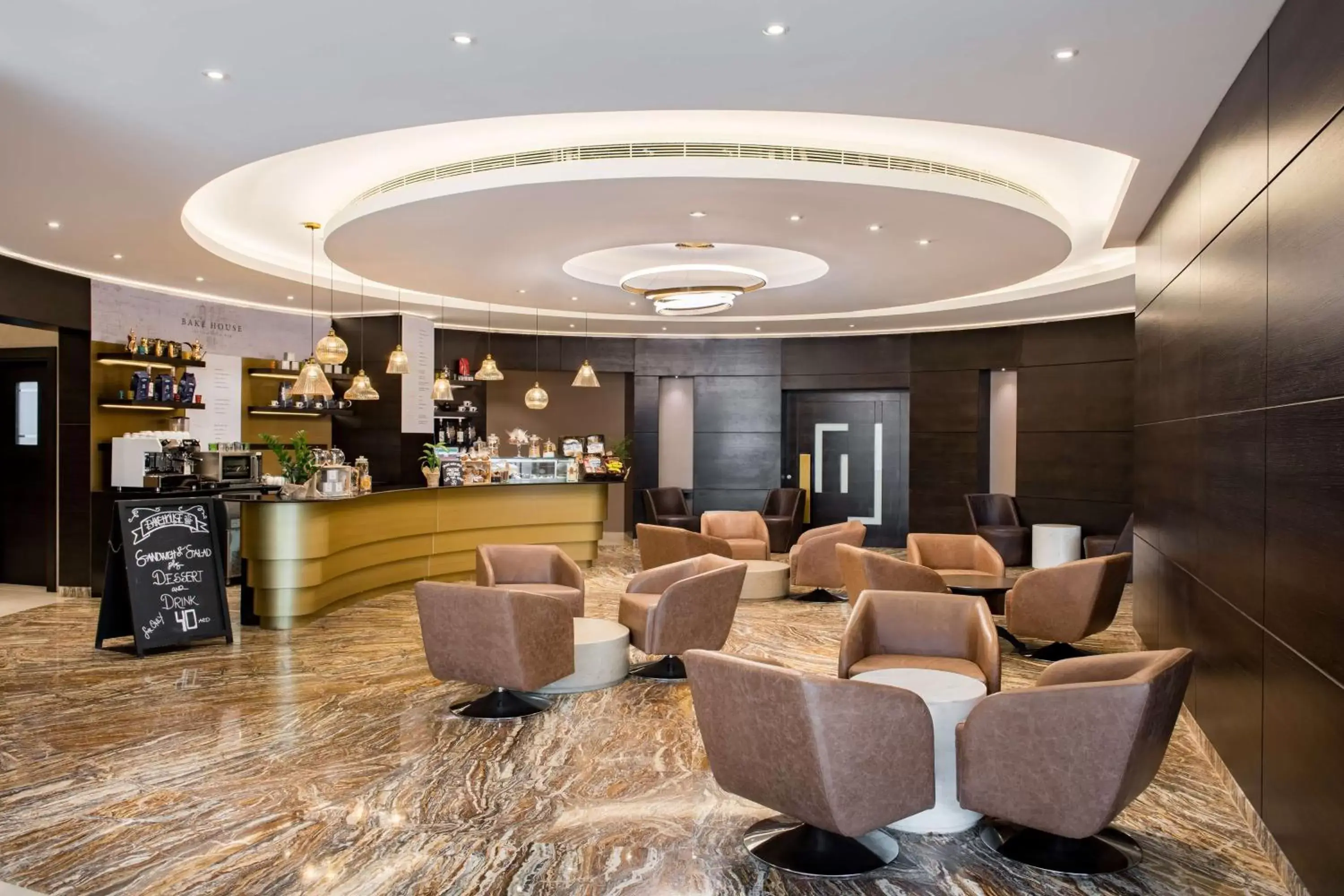 Lounge or bar, Lobby/Reception in Radisson Blu Hotel, Dubai Canal View