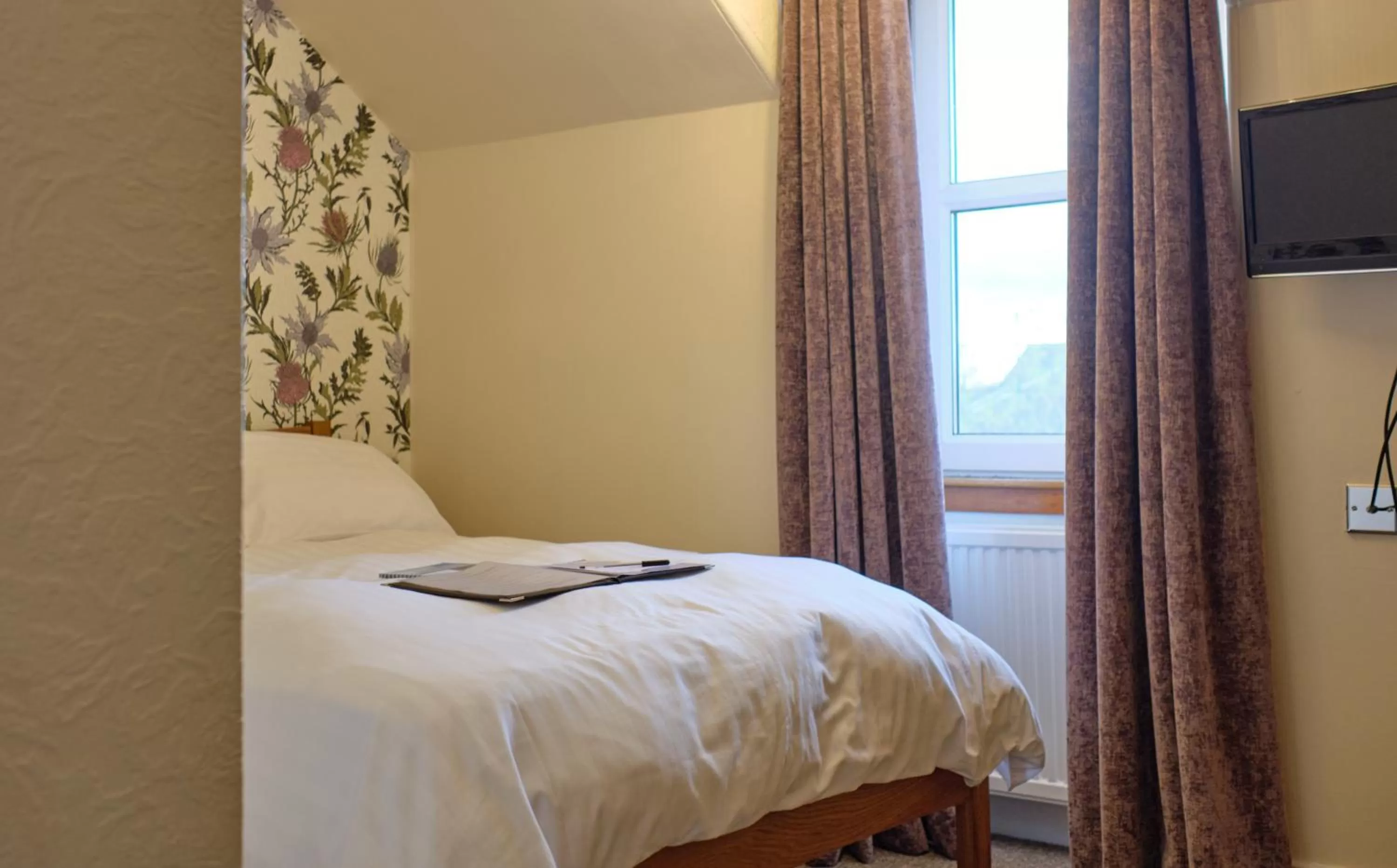 Bed in Ravenswood Guest House