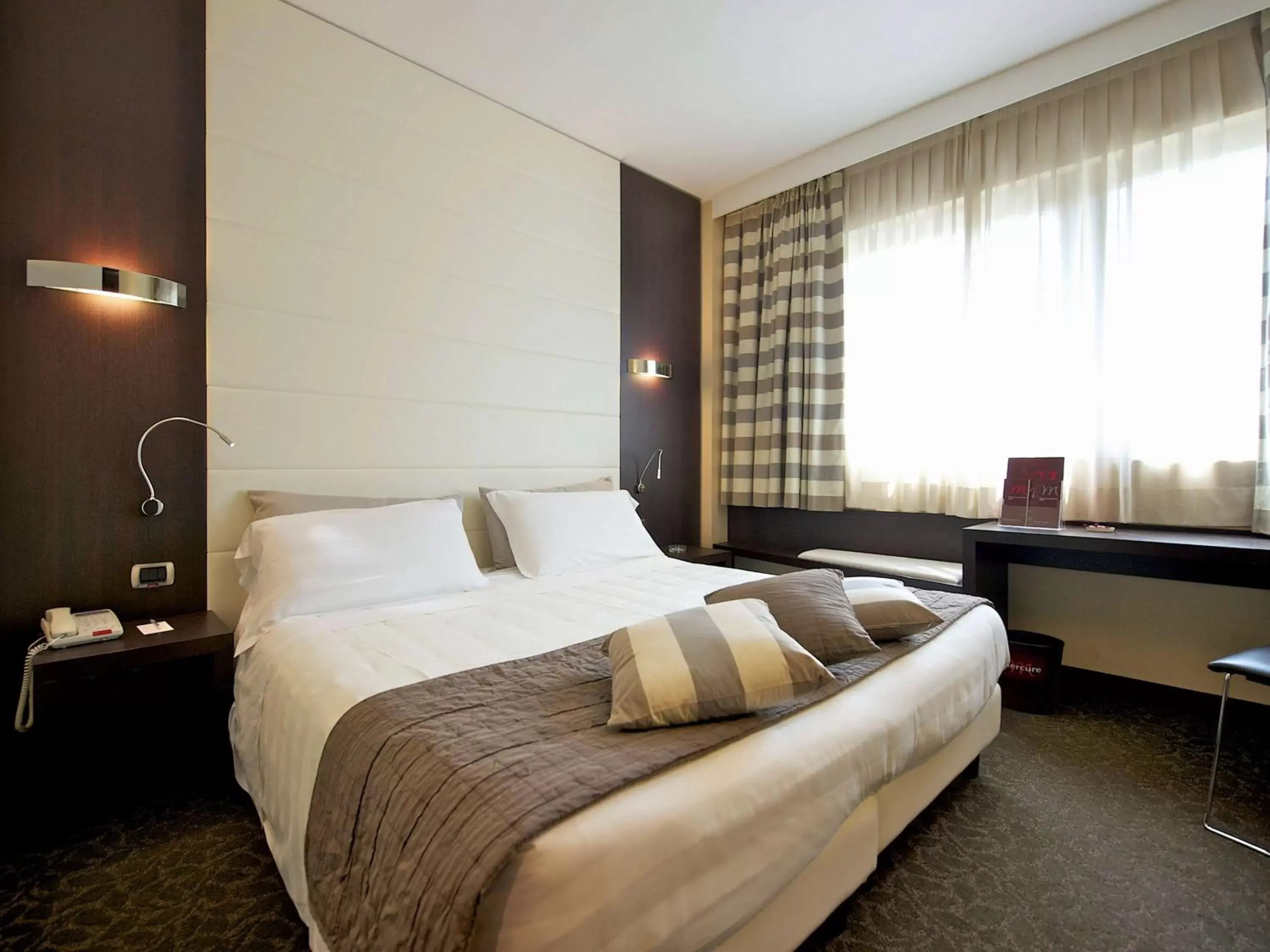 Photo of the whole room, Bed in Mercure Bergamo Aeroporto