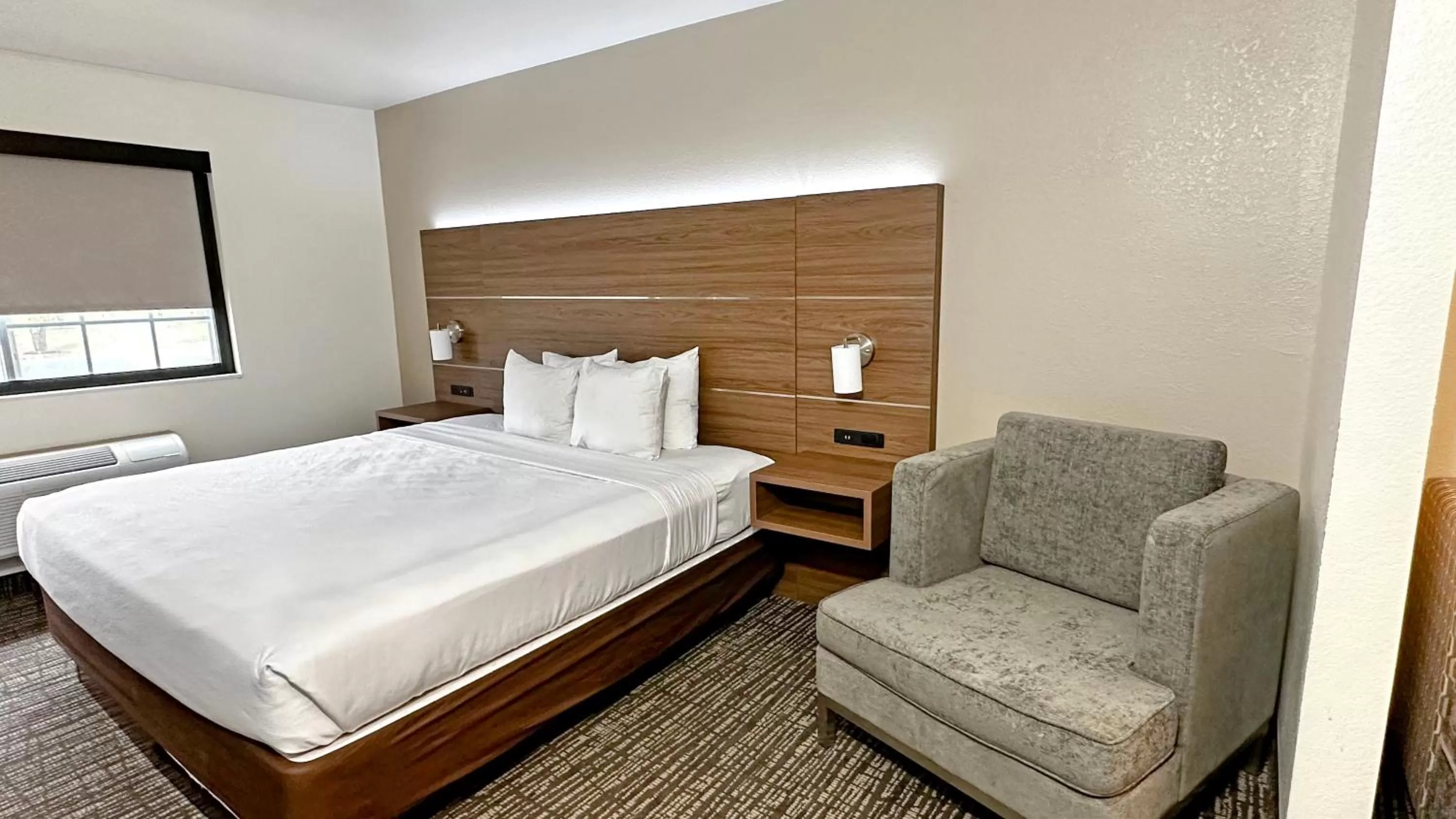 Bed in Estherville Hotel & Suites