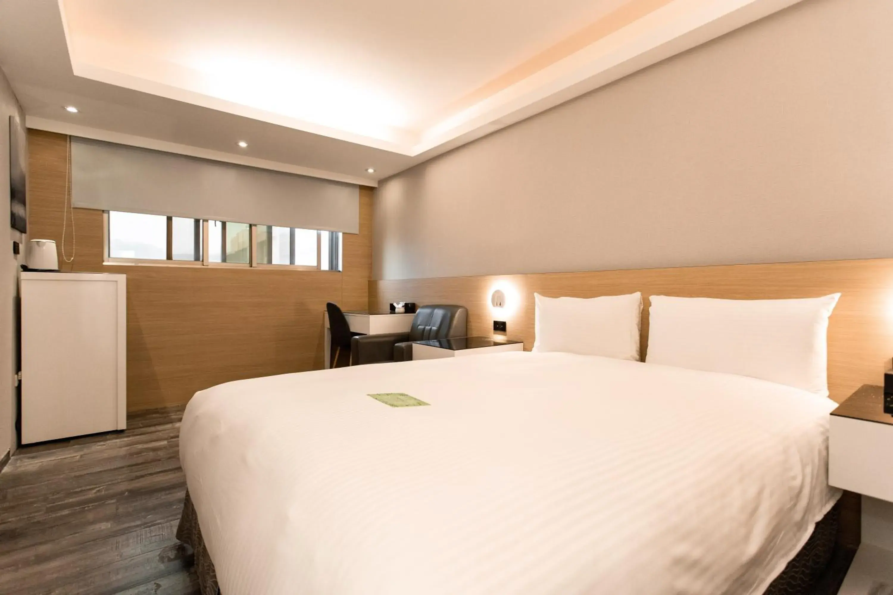 Bed in Hub Hotel Tucheng