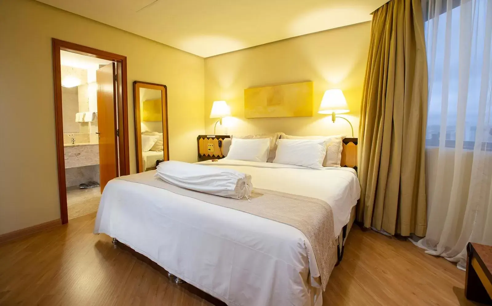 Bed in Golden Tower Pinheiros by Fênix Hotéis