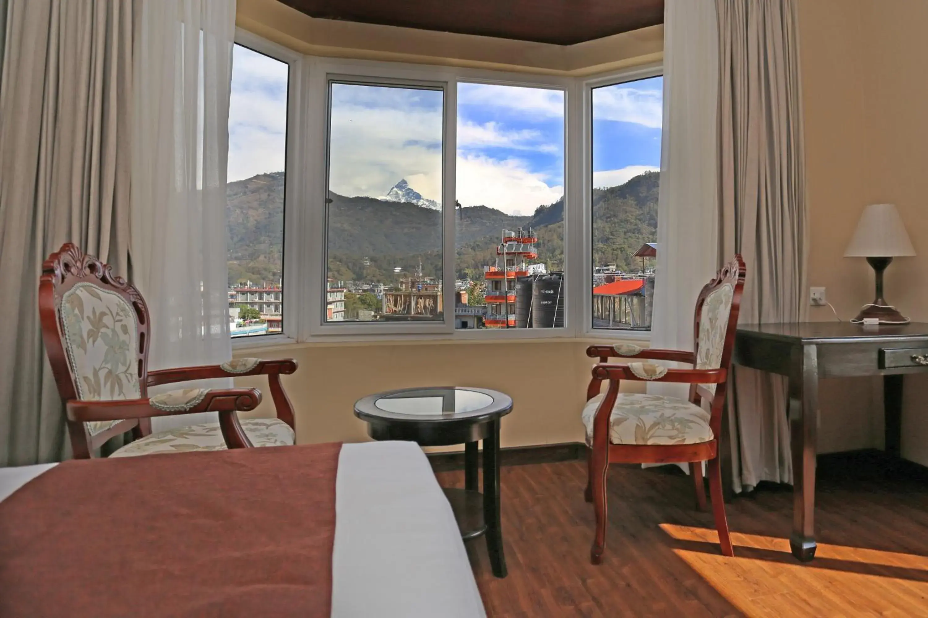 Seating area, Mountain View in Da Yatra Courtyard Hotel Seating area, Mountain View in Da Yatra Courtyard Hotel