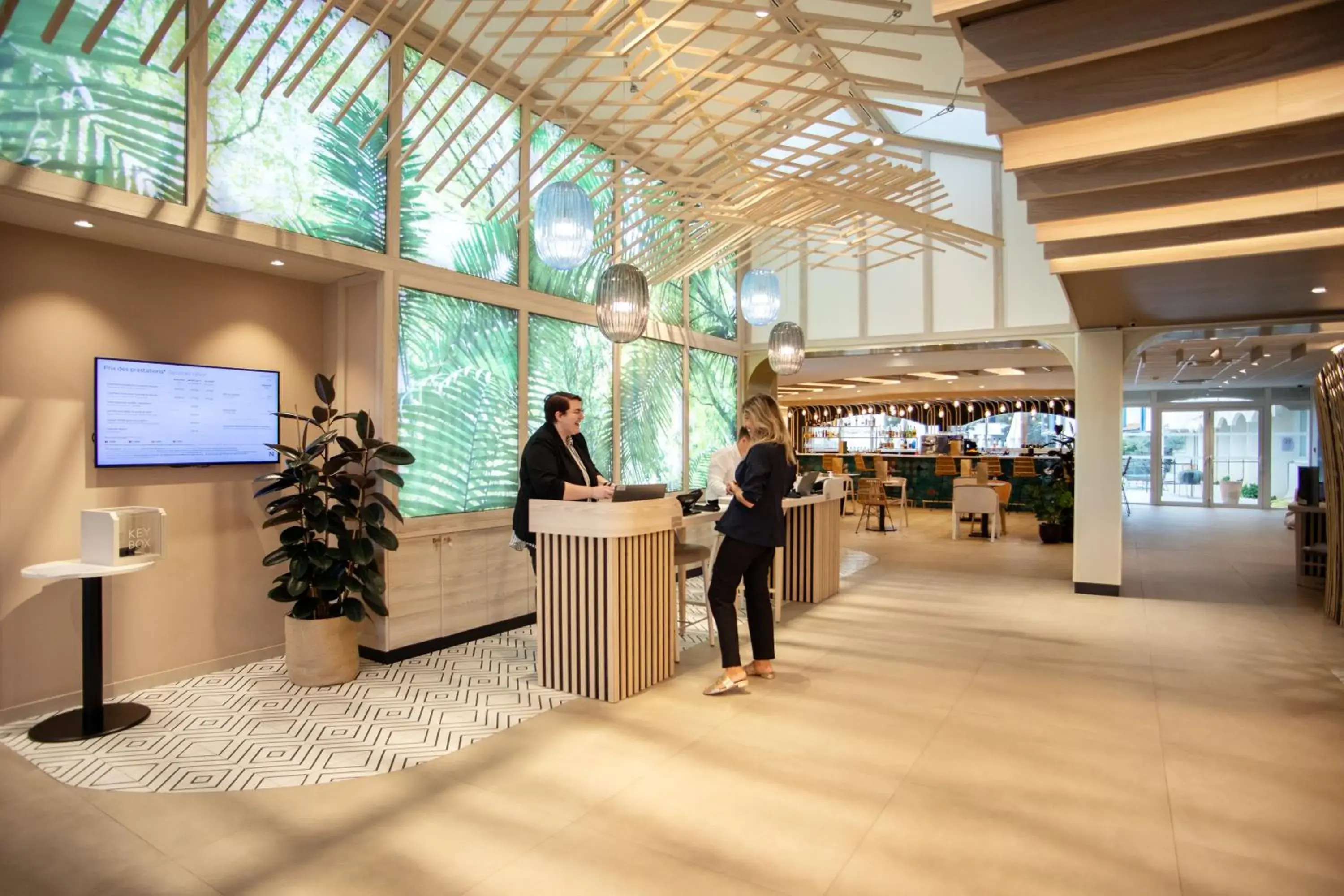 Lobby or reception in Novotel Montpellier