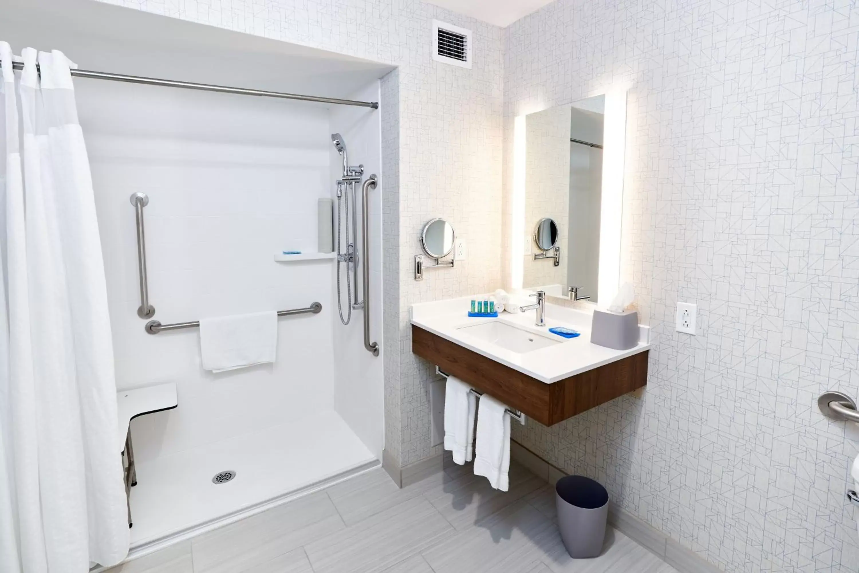 Bathroom in Holiday Inn Express Hotel & Suites Dieppe Airport, an IHG Hotel