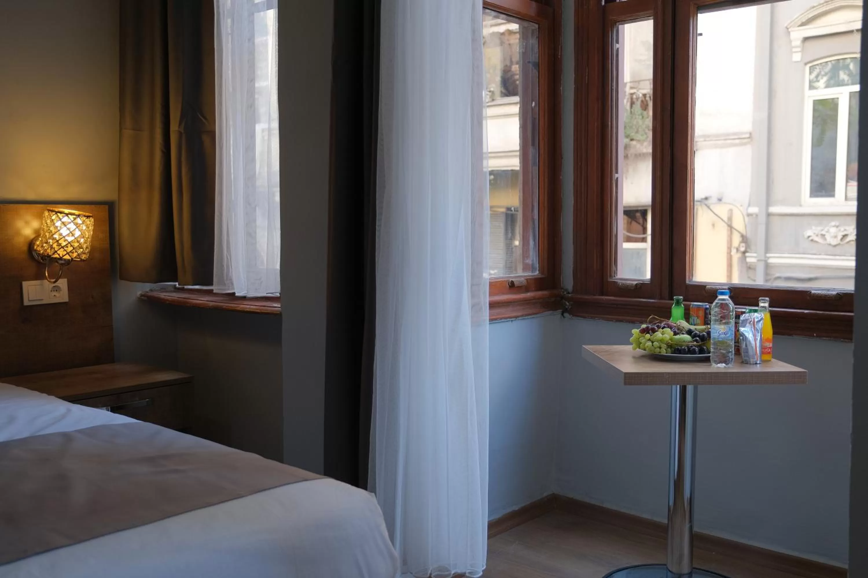 Bed in Adamantides Hotel