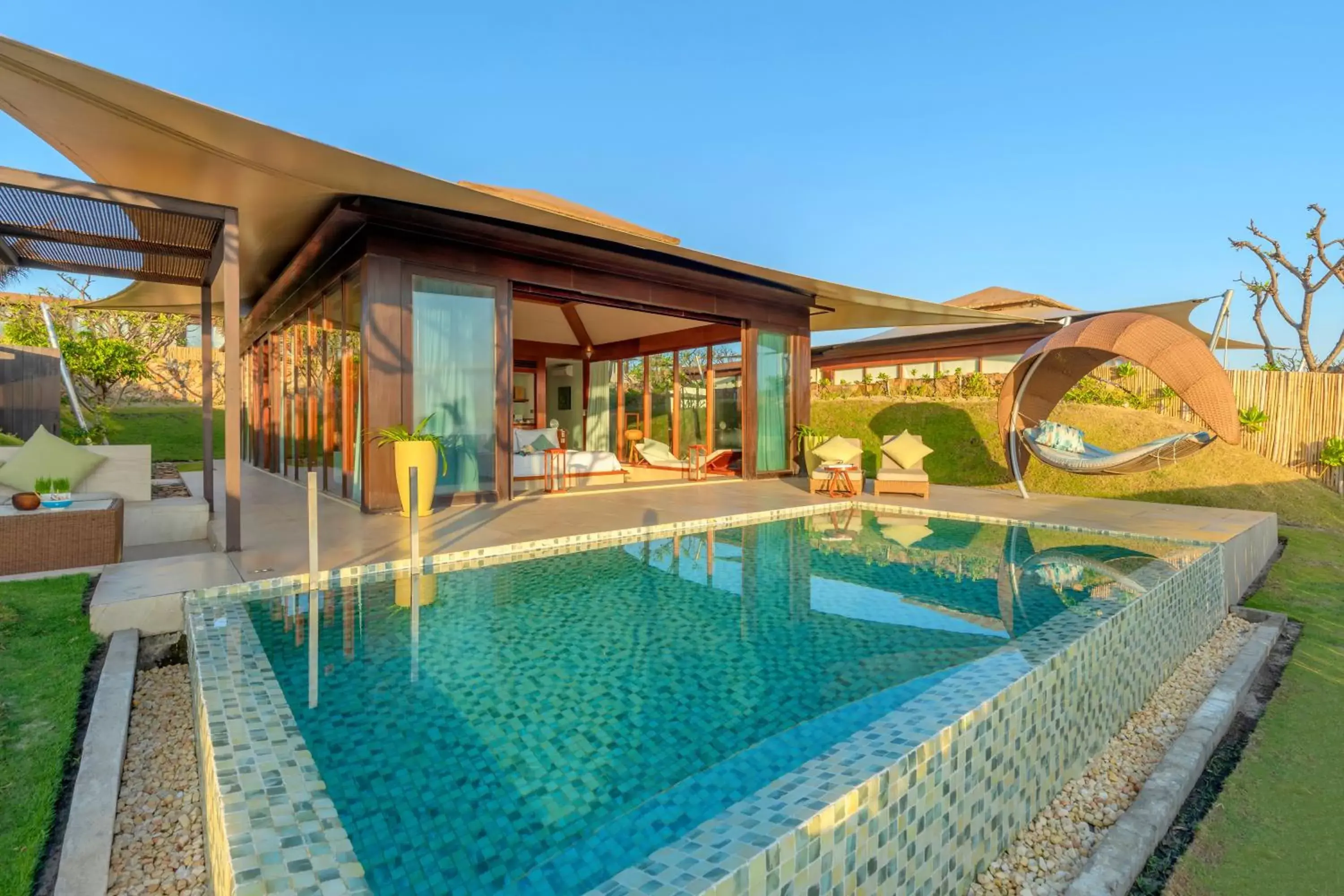 Patio, Swimming Pool in Fusion Resort Cam Ranh - All Spa Inclusive