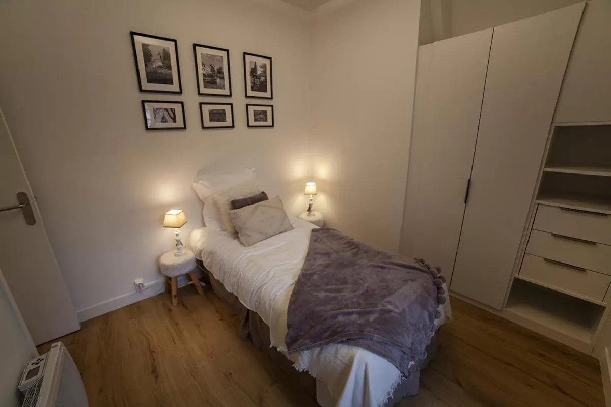 Bed in Bienvenue Chez Nous