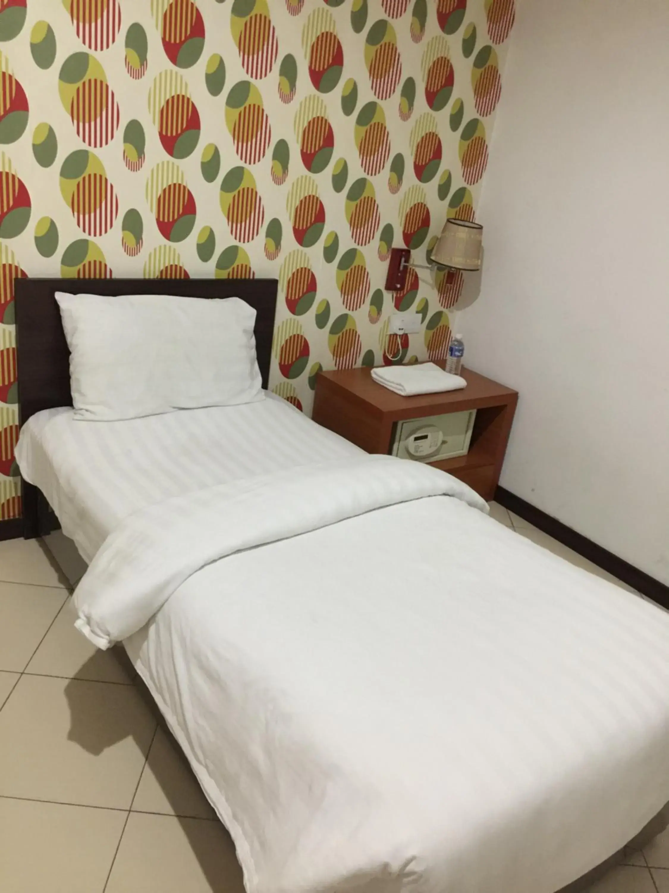 Bed in Permai Hotel