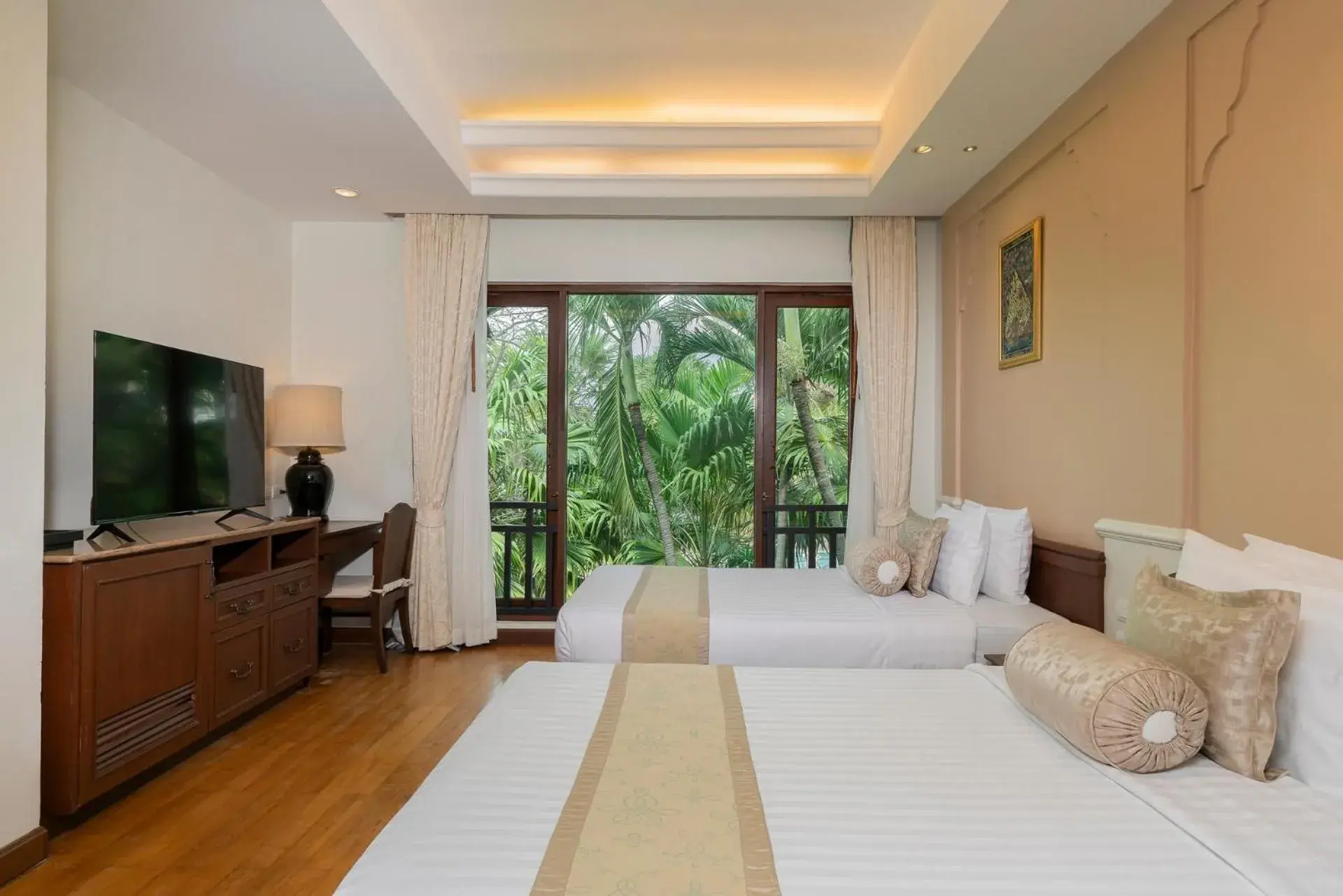 Bedroom in Ravindra Beach Resort & Spa - SHA Extra Plus