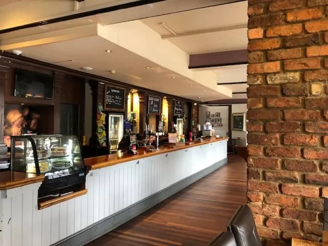 Lounge or bar in The Raven Hotel