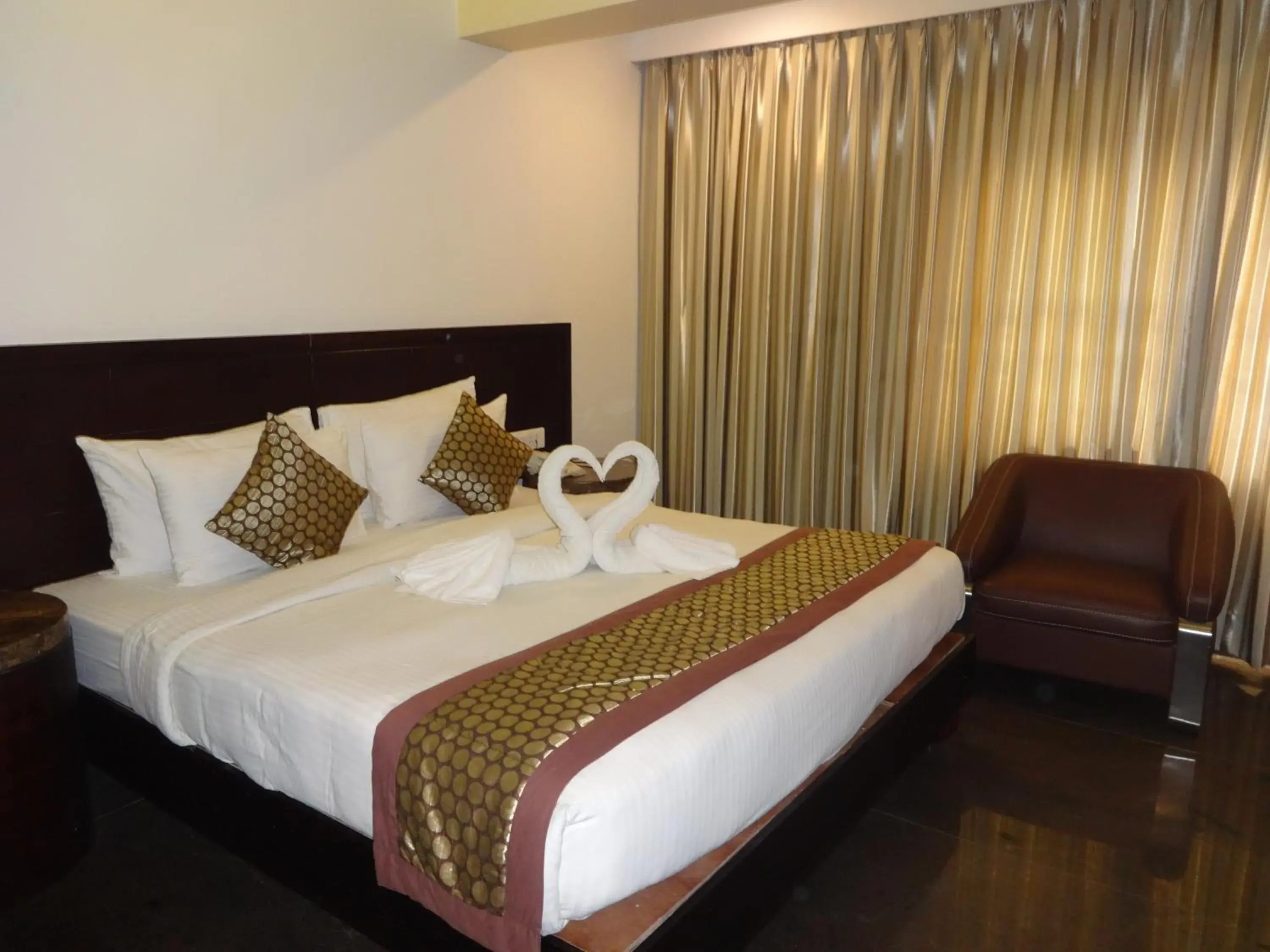 Bed in Pride Ananya Resort Puri