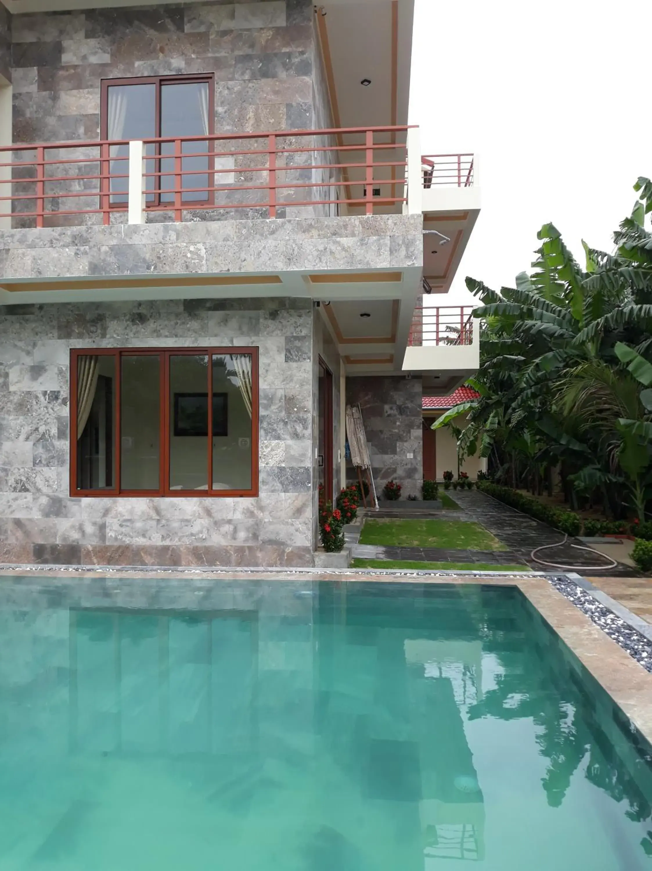 Balcony/Terrace, Swimming Pool in Herbal Tea Homestay