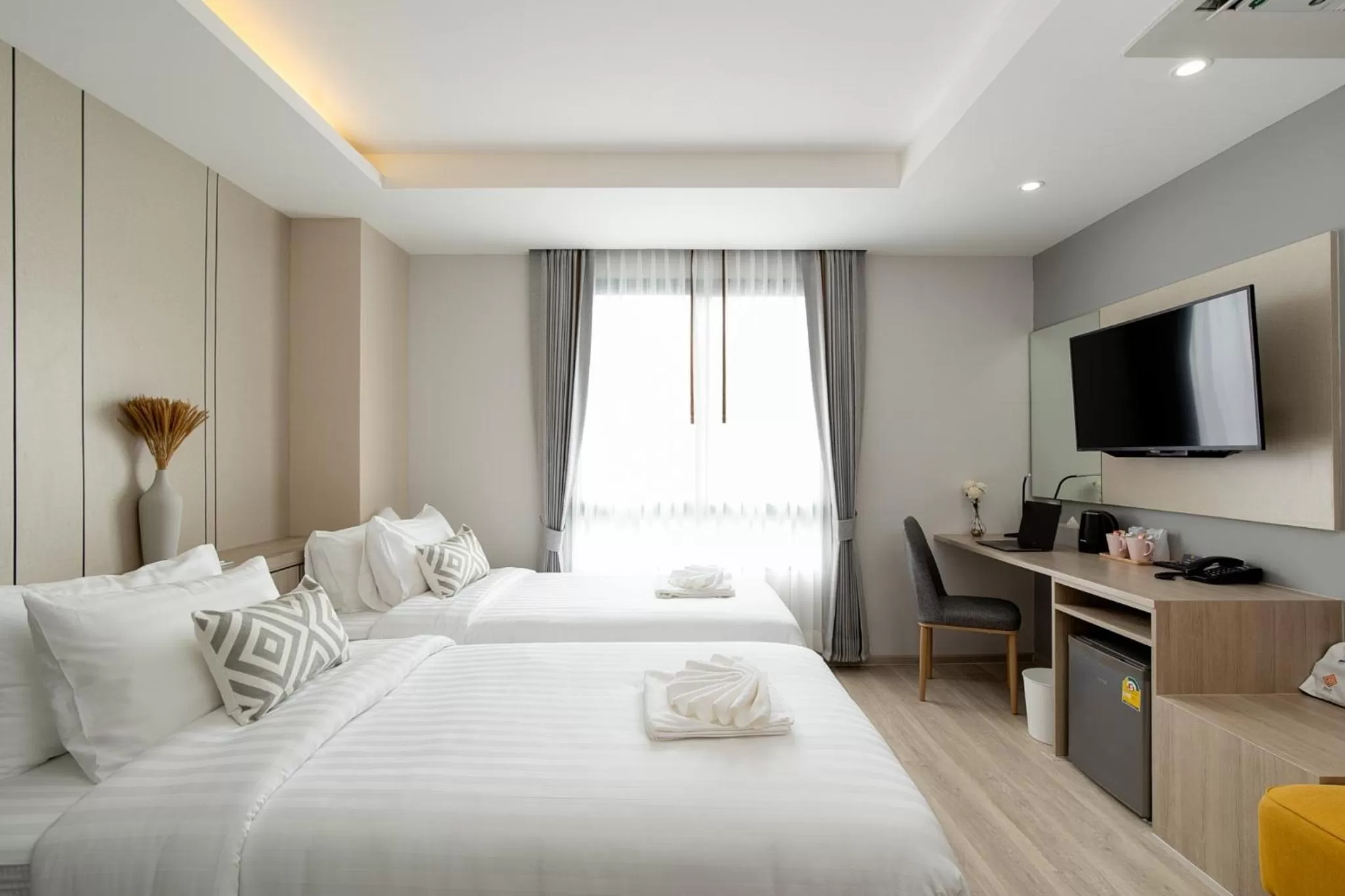 Bed in The Riski Hotel at Bangphlat Station SHA