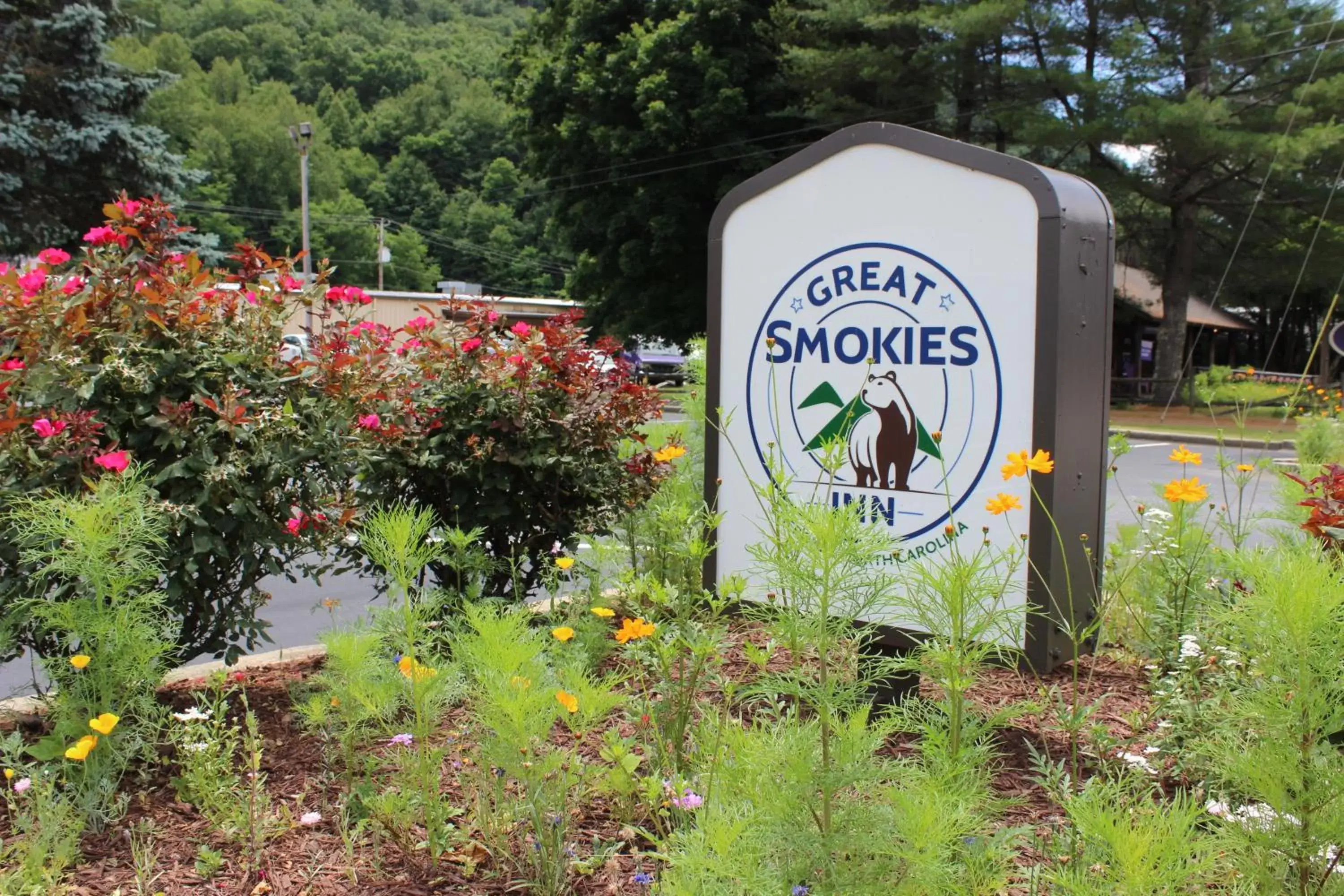 Property logo or sign in Great Smokies Inn - Cherokee