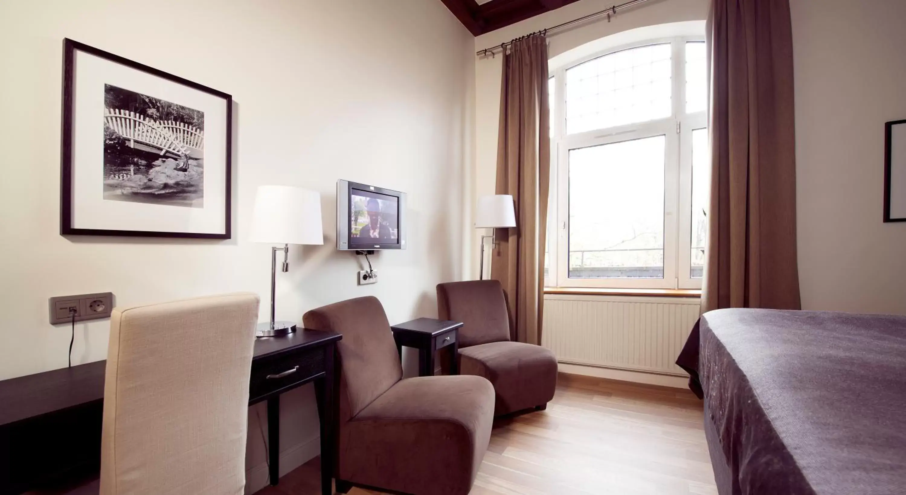 Seating area, TV/Entertainment Center in Clarion Collection Hotel Norre Park