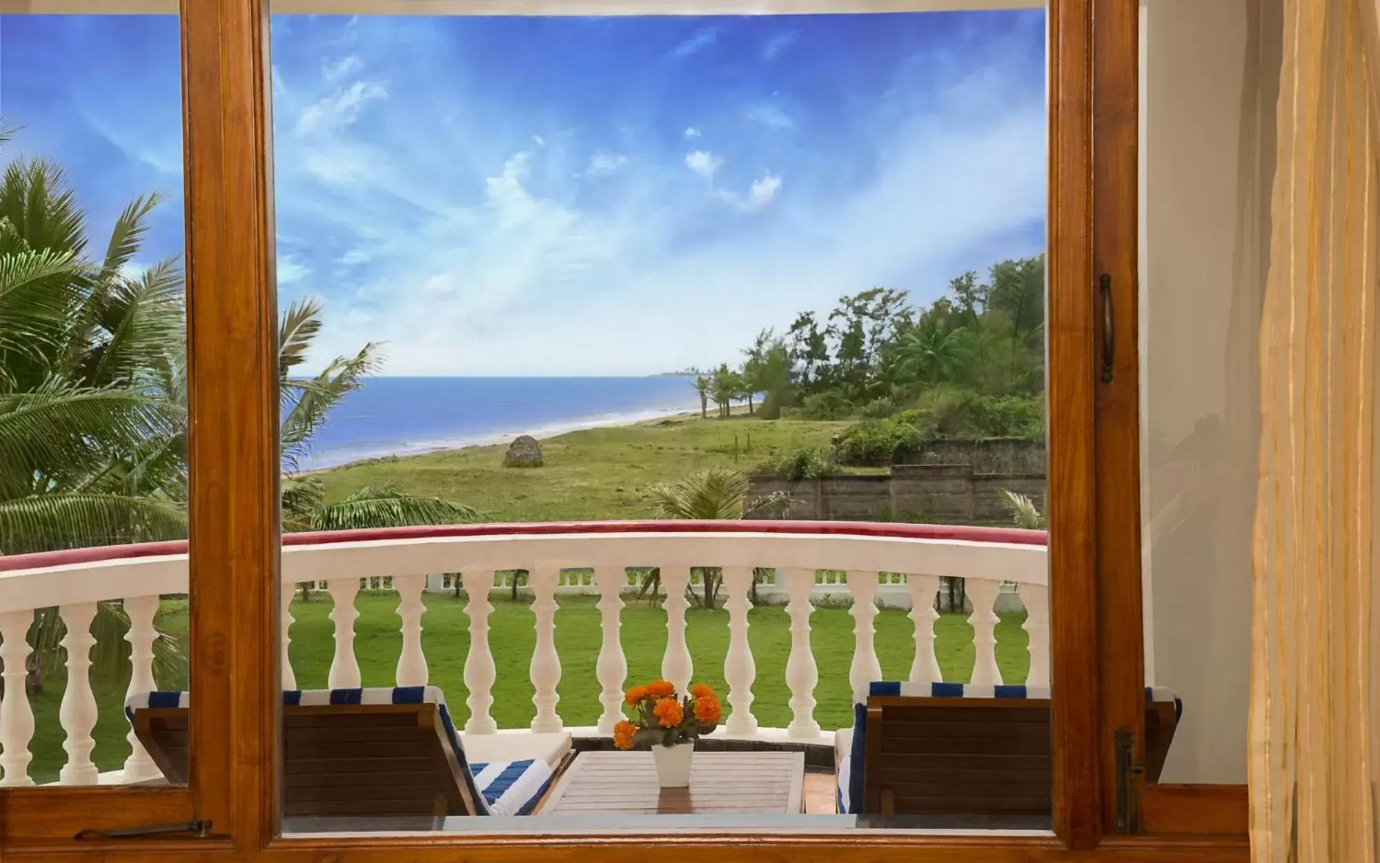 Garden view, Balcony/Terrace in Ideal Beach Resort