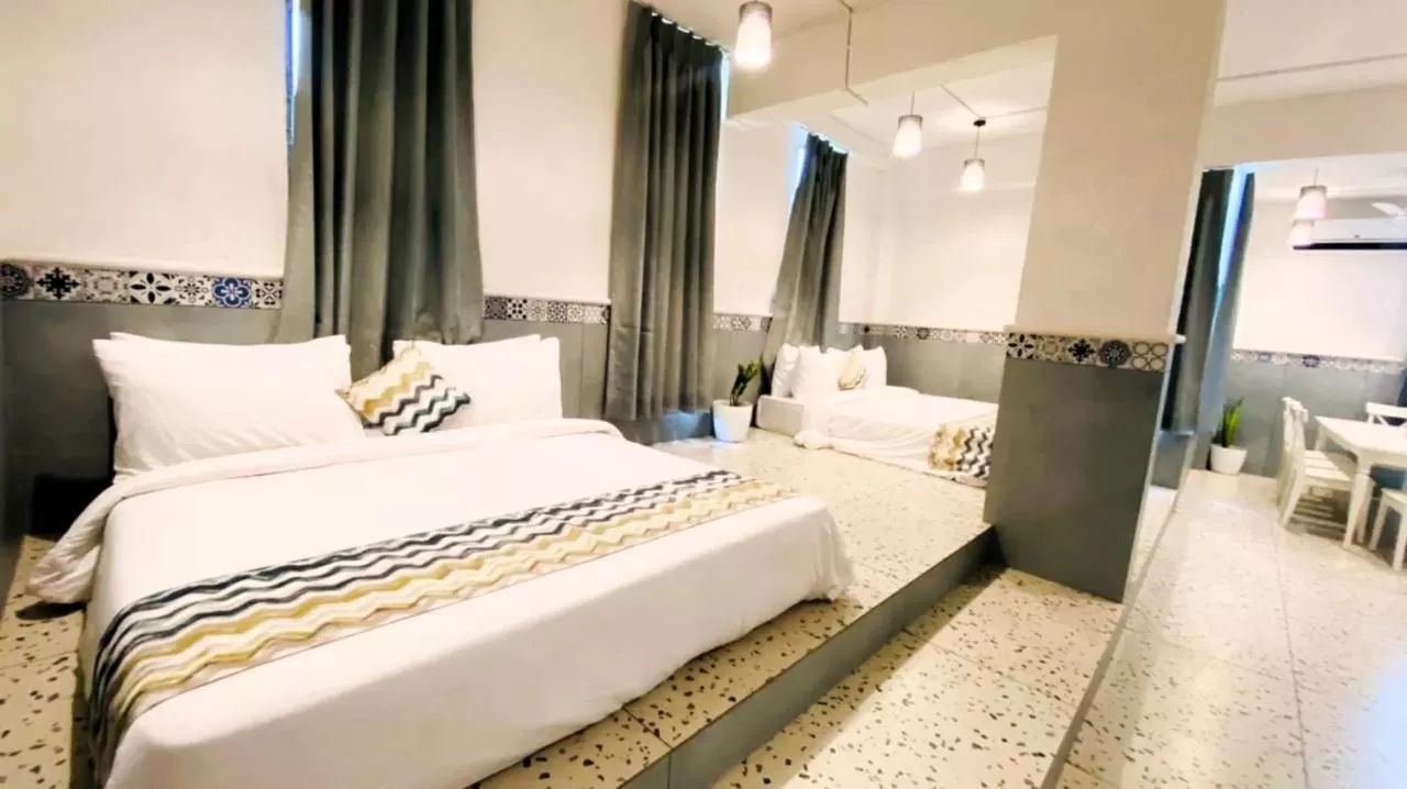 Bed in Nest Beacon Resort Daman