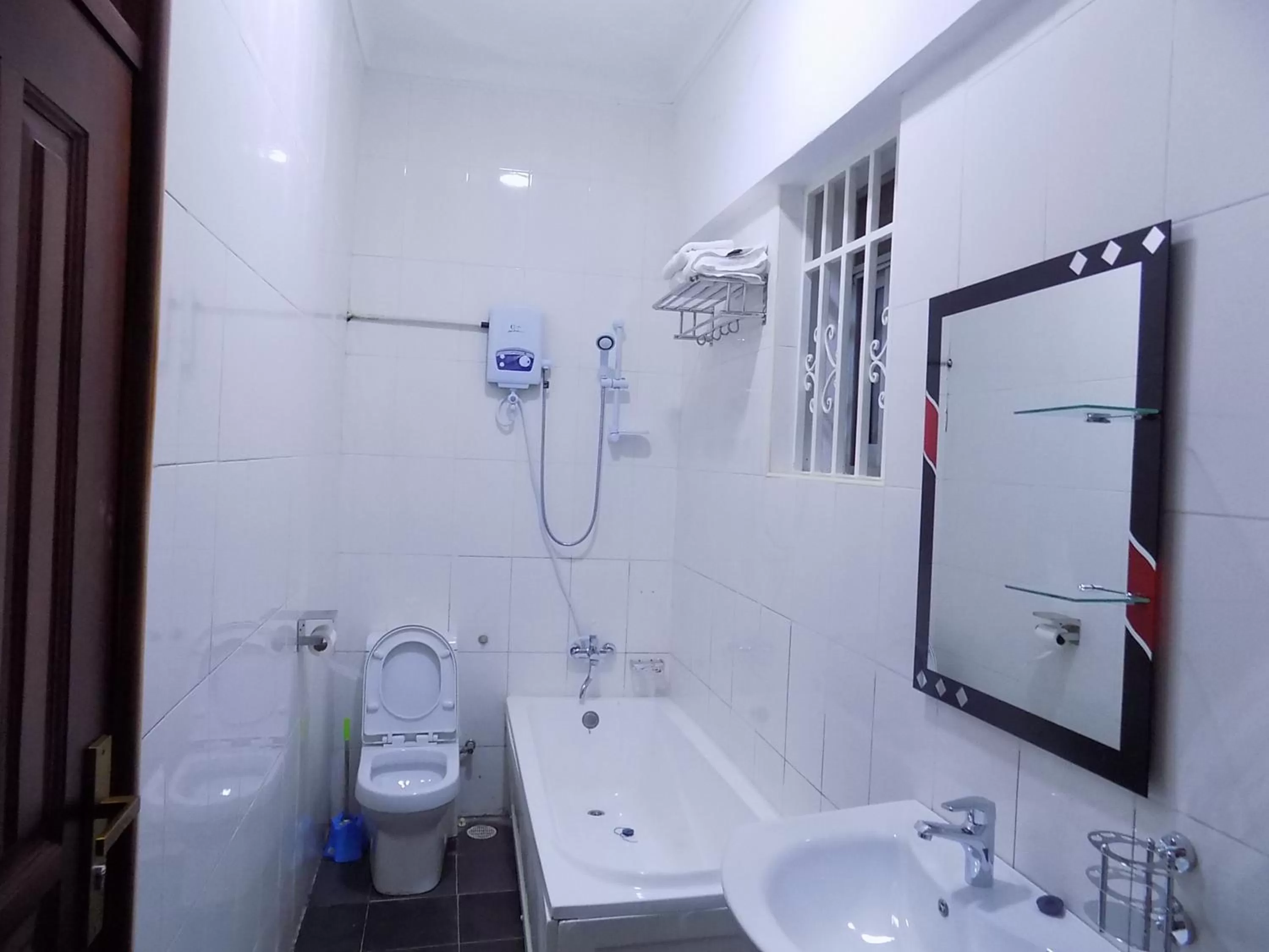 Shower in Sunrise Hotel Kampala