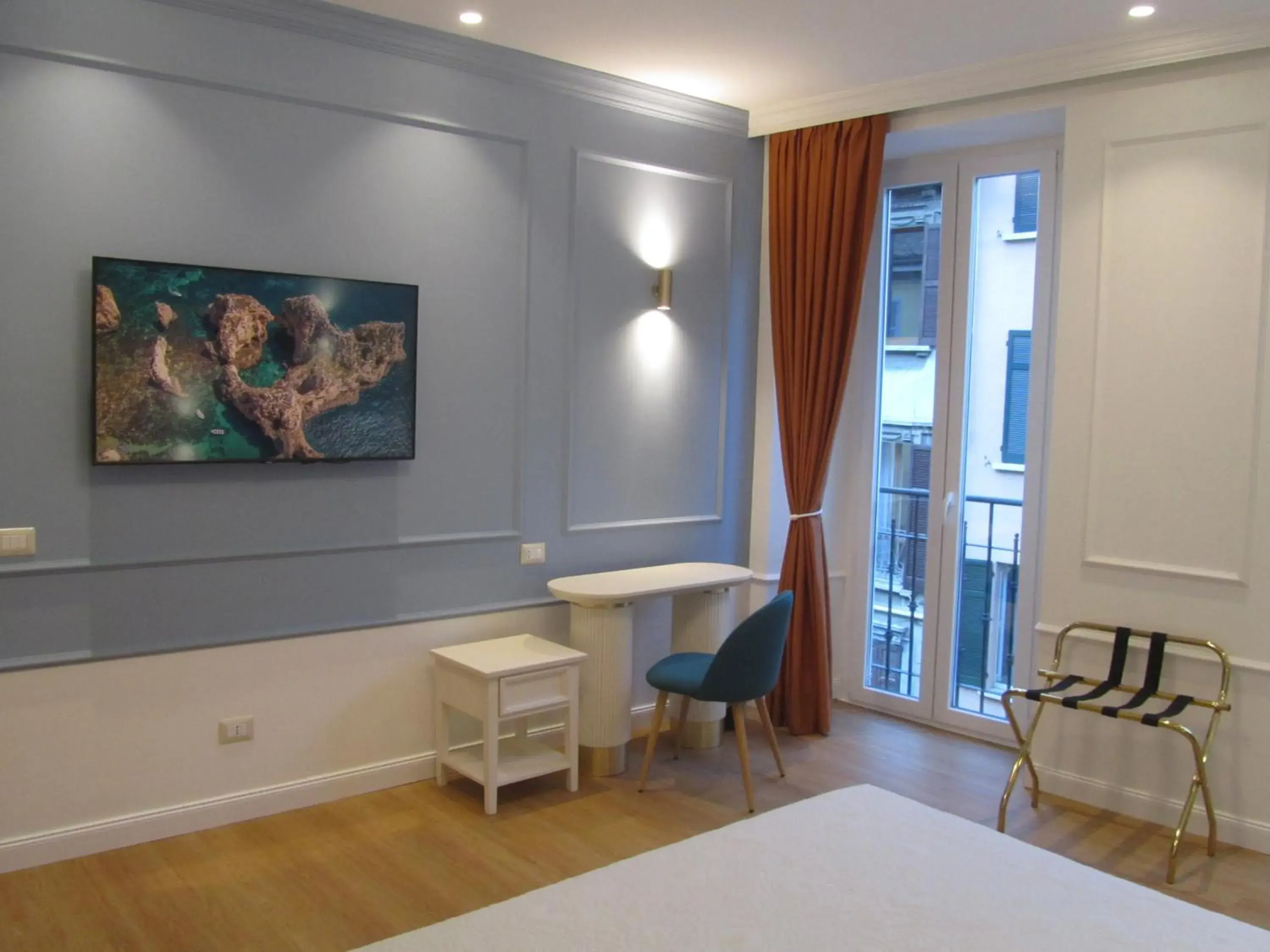 Bedroom, TV/Entertainment Center in Hotel Borgovico