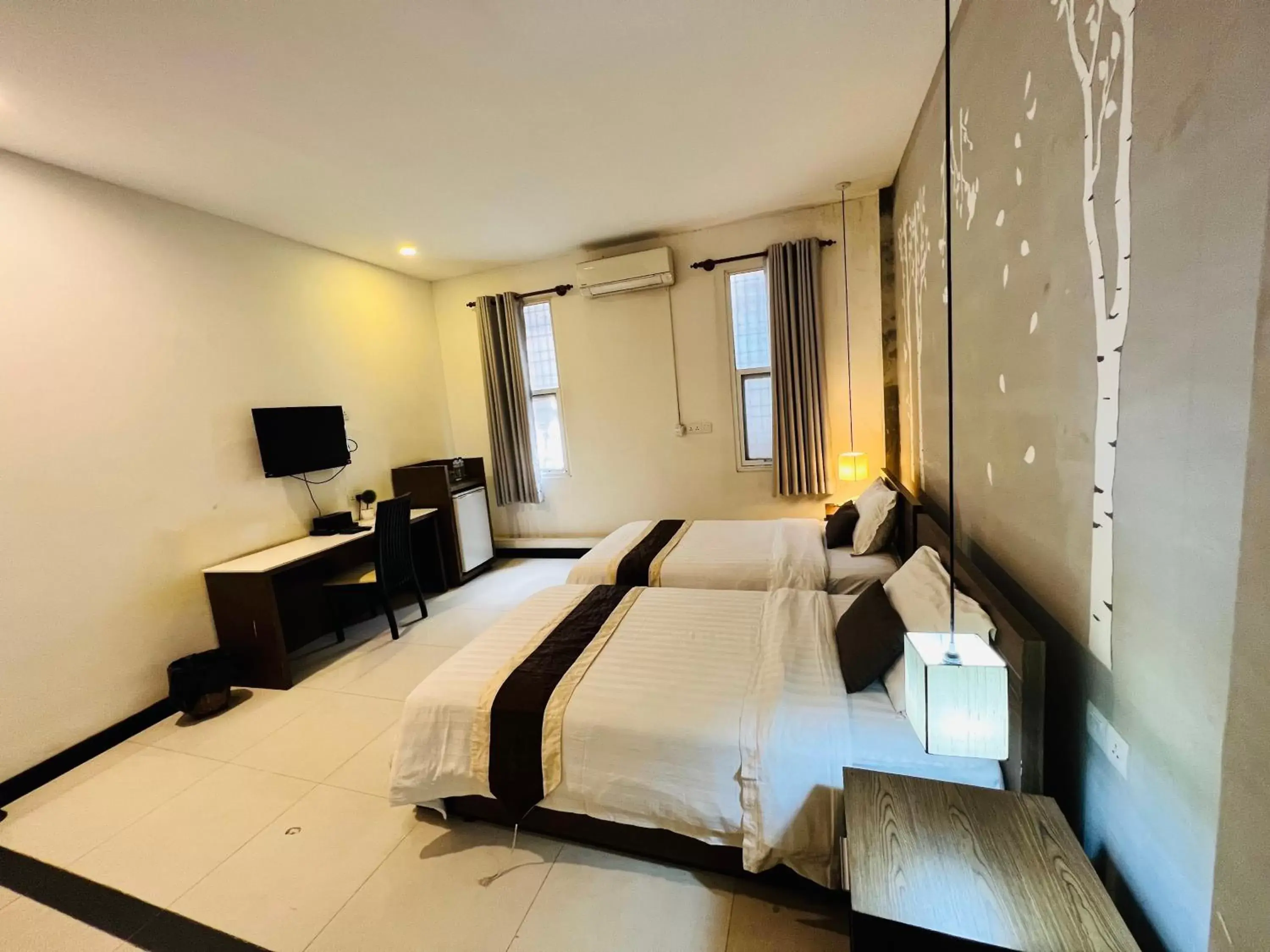 Bed in Asiban Quay Boutique Hotel