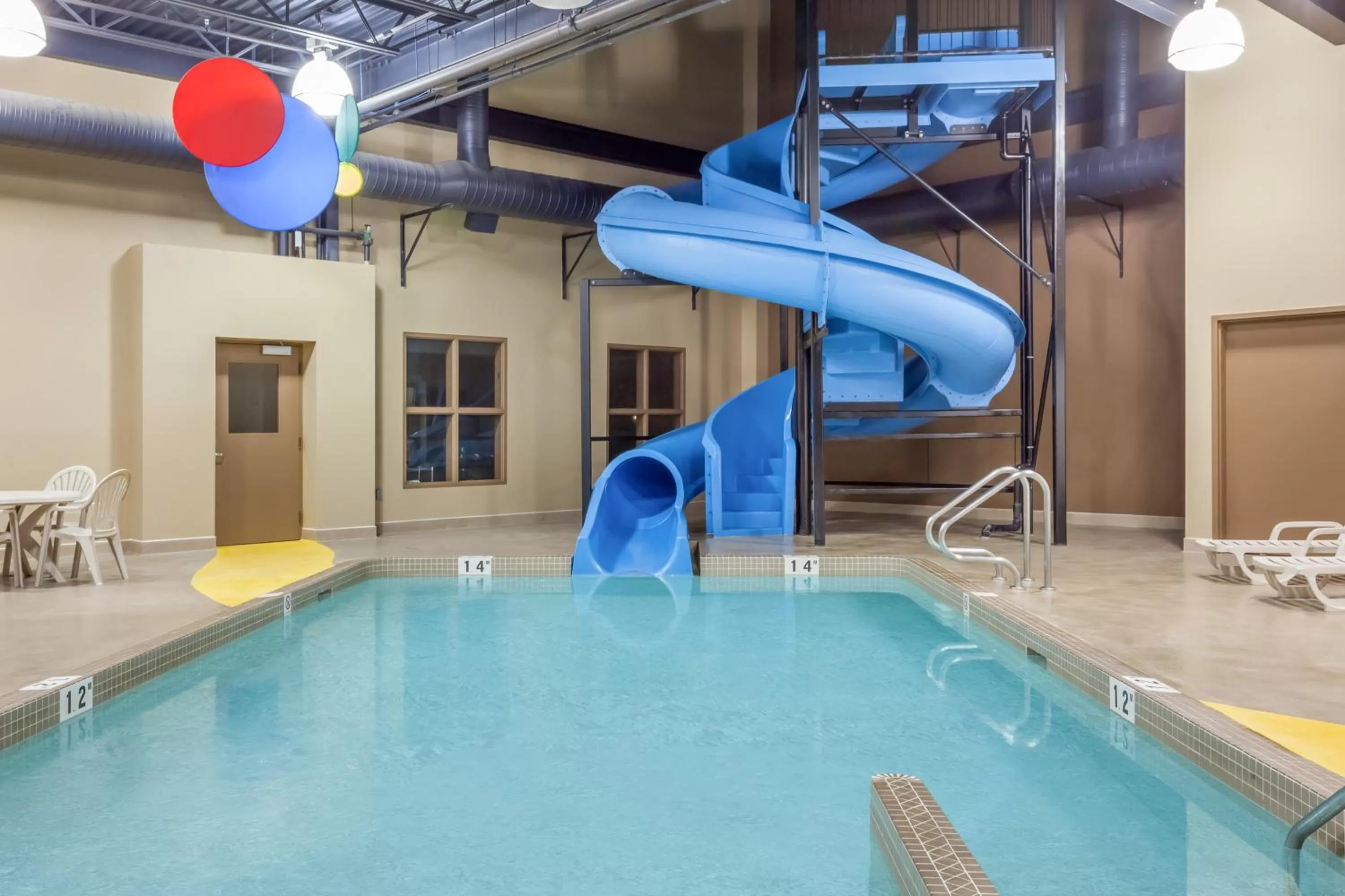 Swimming pool in Microtel Inn & Suites by Wyndham Estevan
