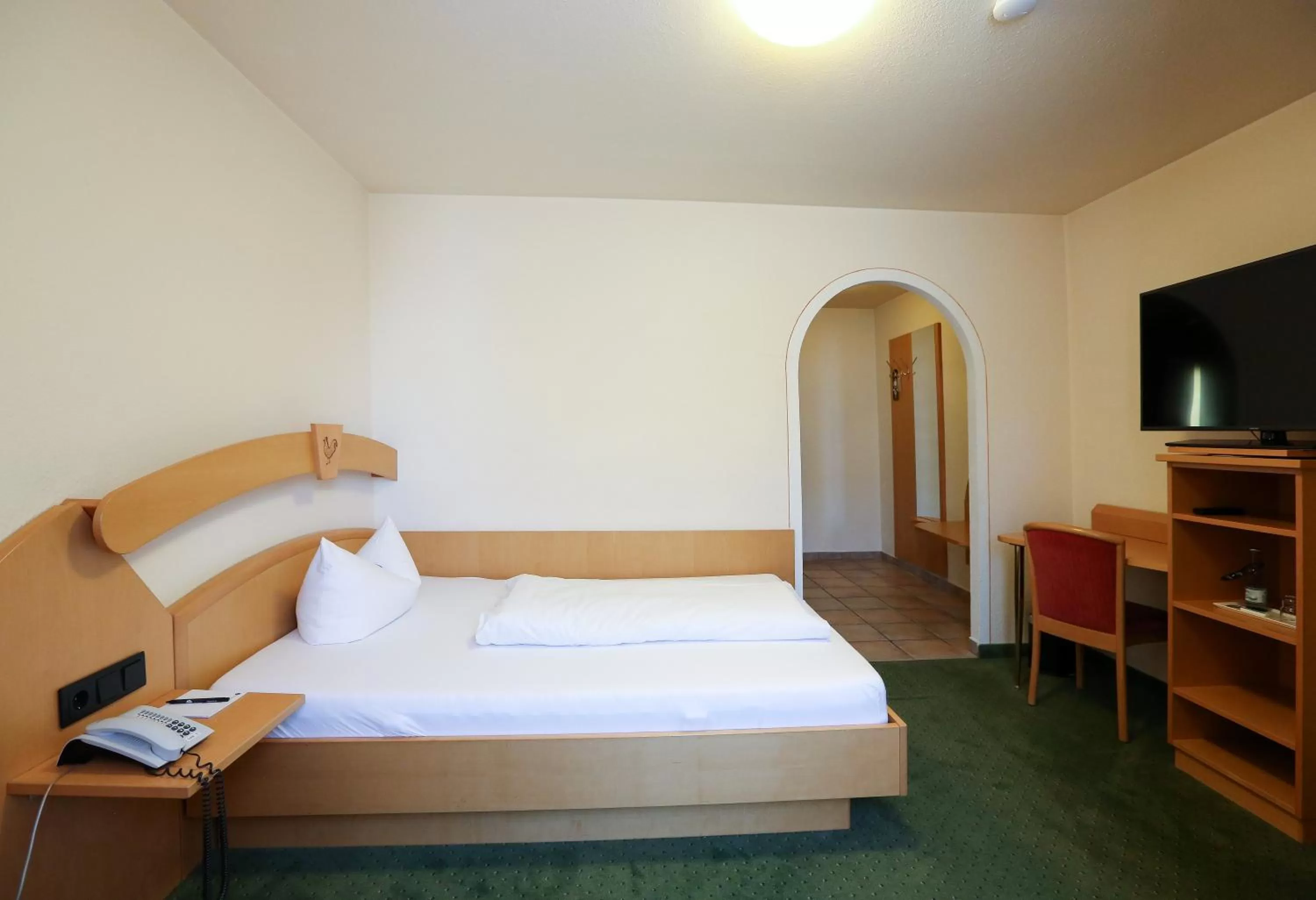 Bed in Arthotel ANA Goggl