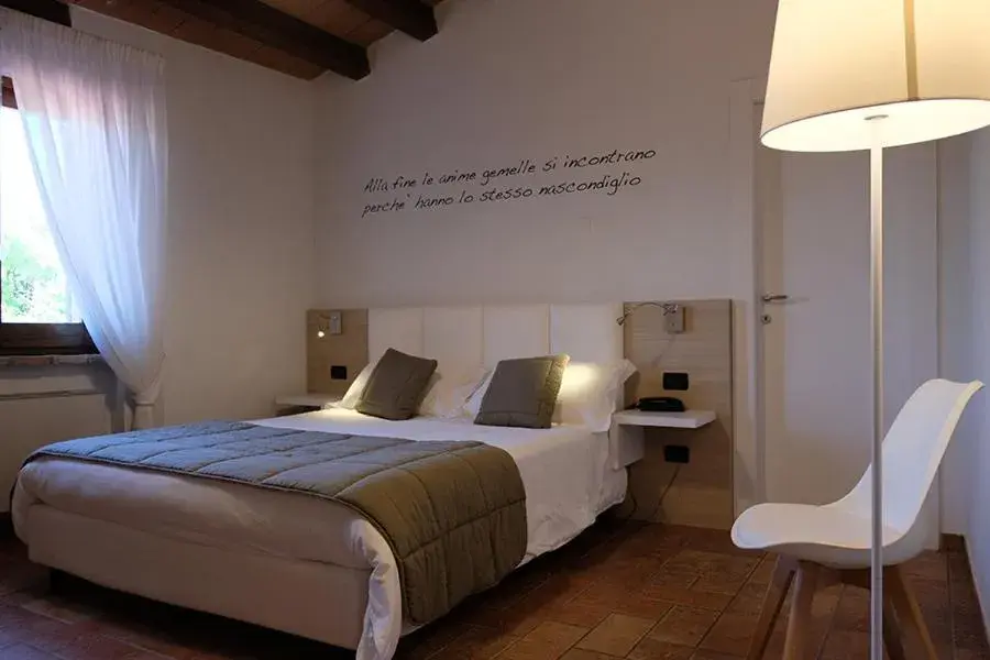 Bed in Relais Madonna di Campagna