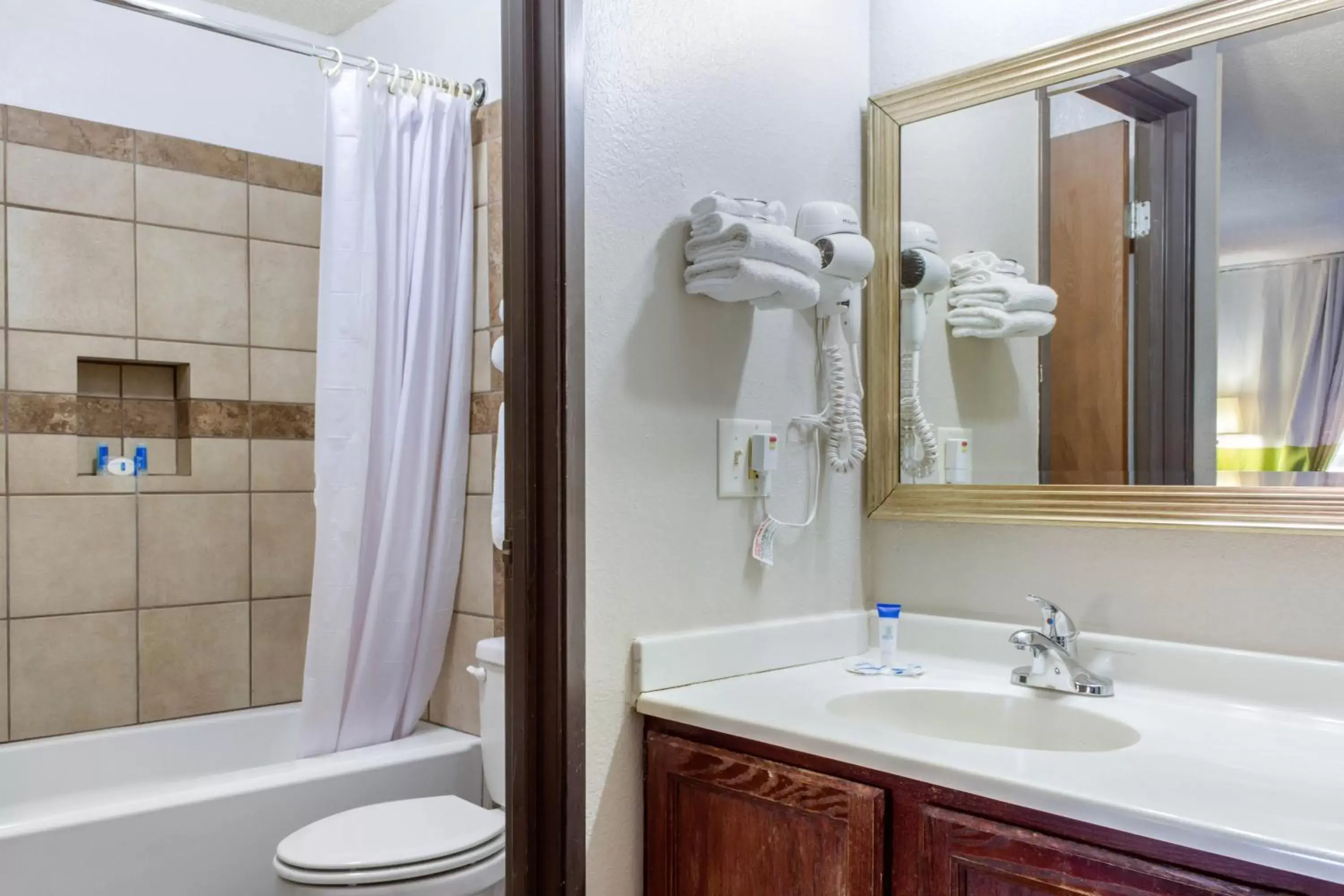 Property building, Bathroom in Rodeway Inn near Ft Huachuca