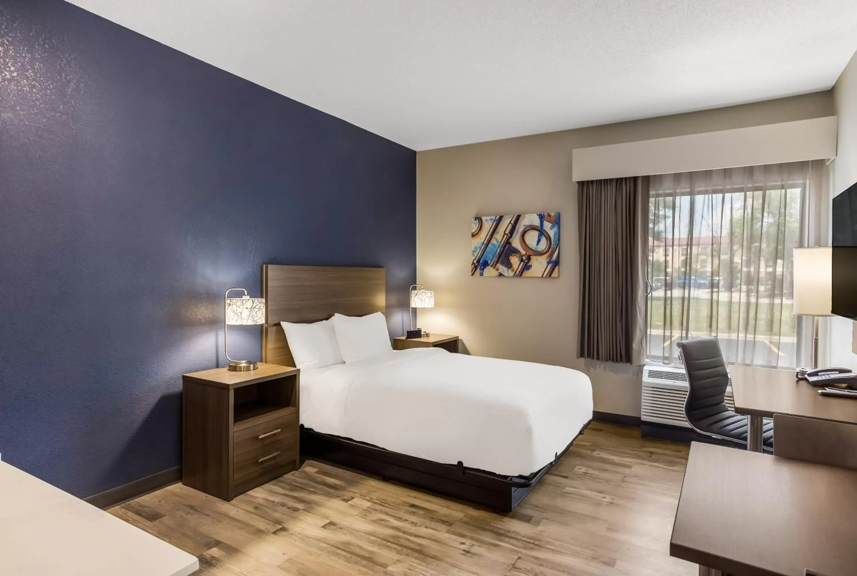 Bed in MainStay Suites Bourbonnais - Kankakee
