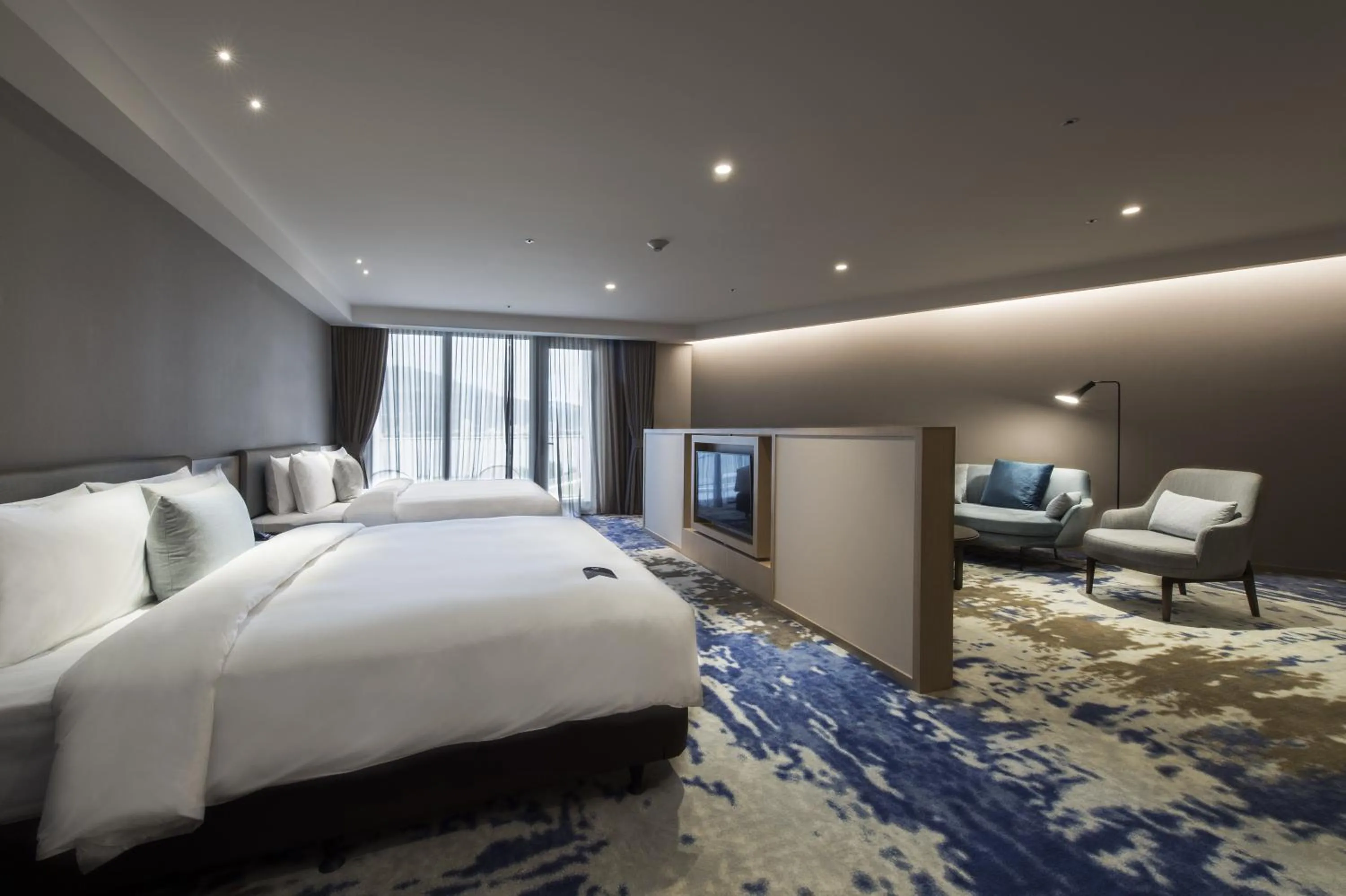 Photo of the whole room, Bed in Golden Tulip FAB Hotel New Taipei