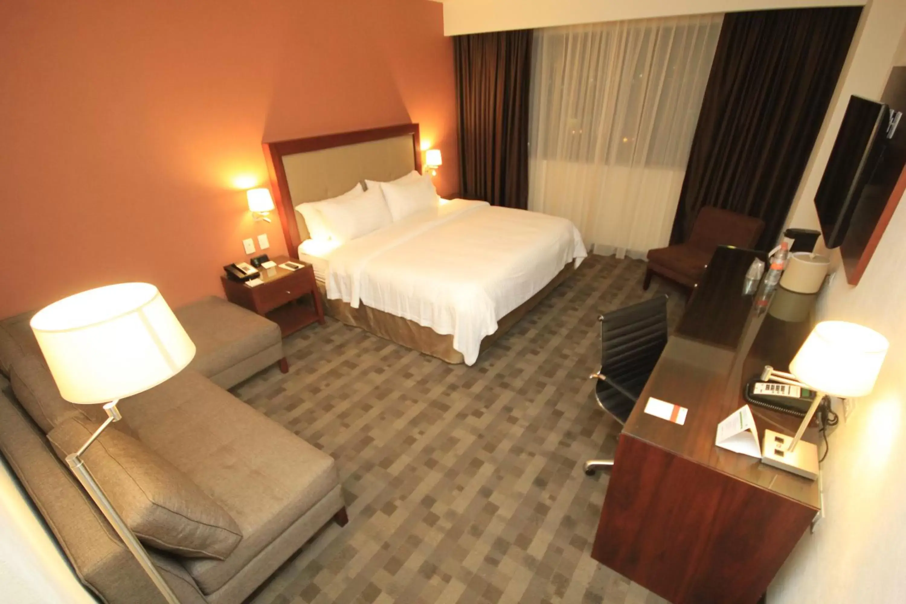 Photo of the whole room, Bed in Holiday Inn & Suites Plaza Mayor, an IHG Hotel