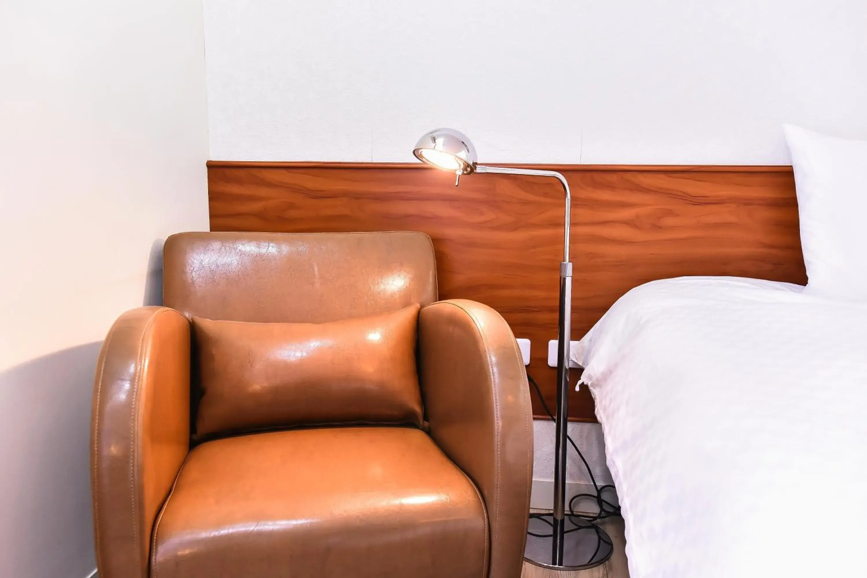 Bedroom, Seating Area in Rainbow Island B&b