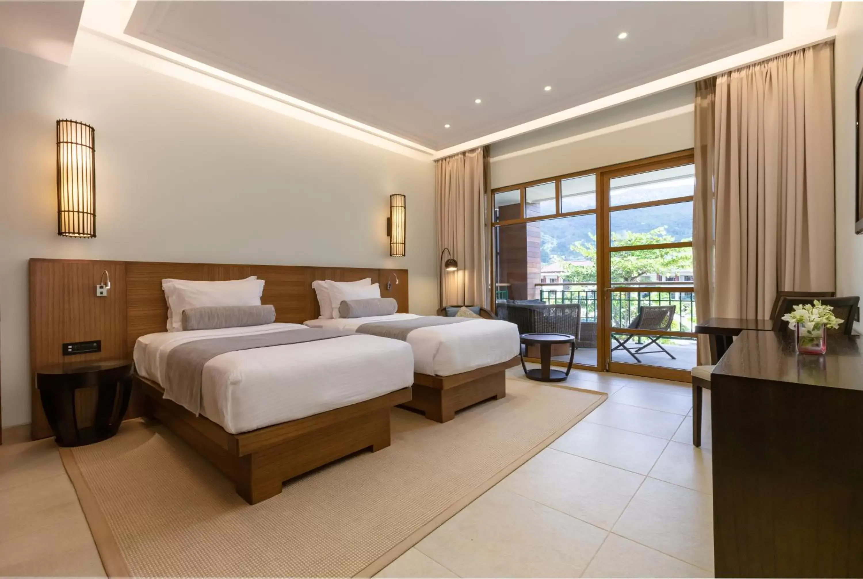 Bed in Savoy Seychelles Resort & Spa Bed in Savoy Seychelles Resort & Spa