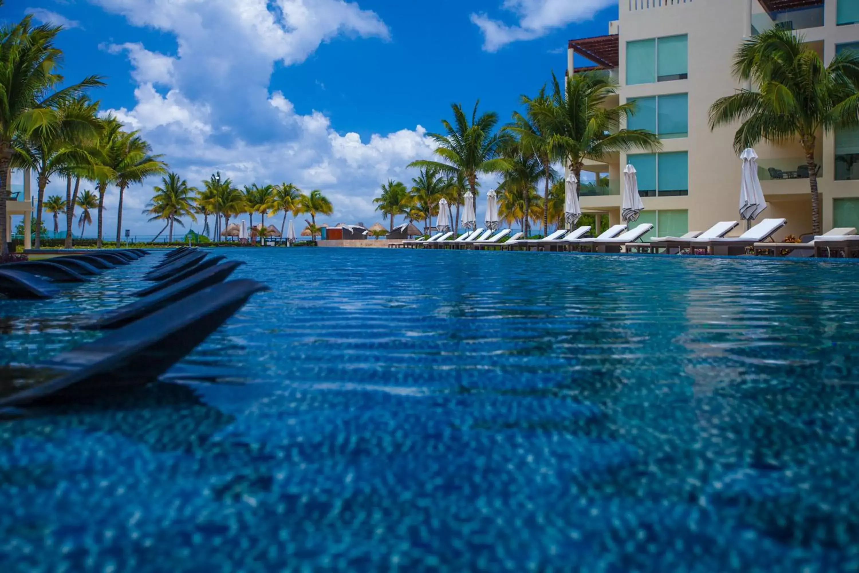 Swimming Pool in The Elements Oceanfront & Beachside Condo Hotel