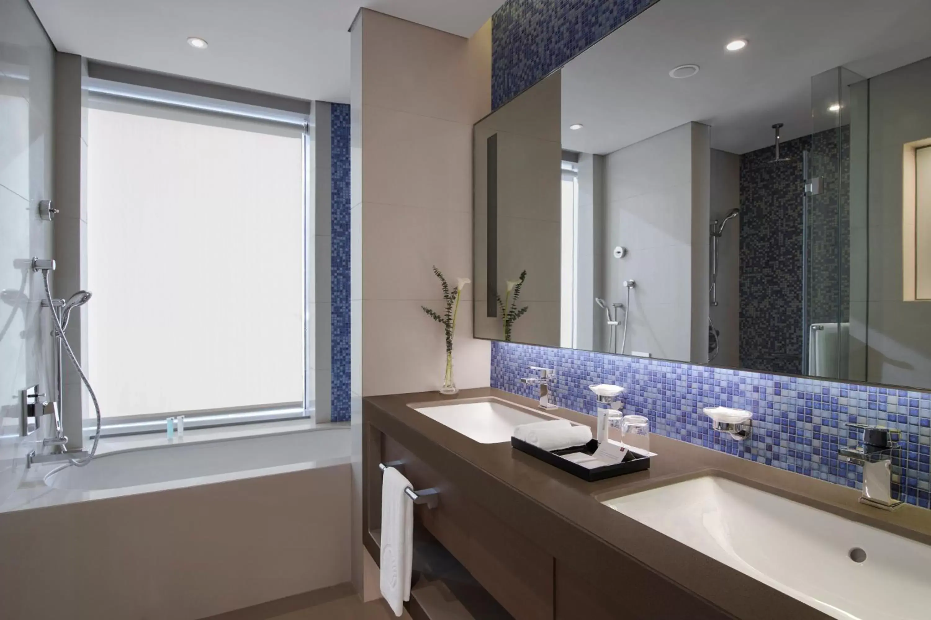 Bathroom in Capital Centre Arjaan by Rotana