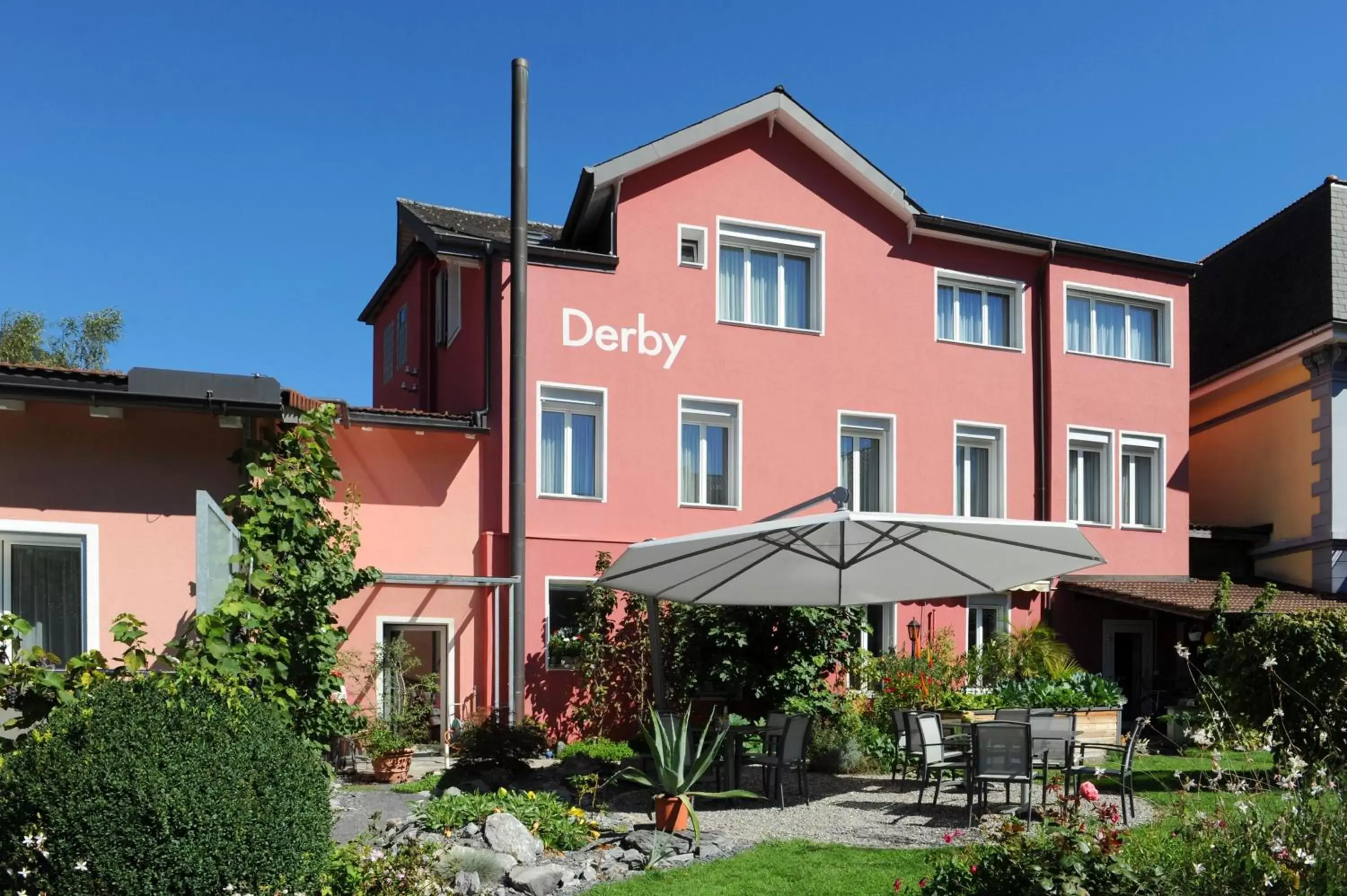 Facade/entrance, Property Building in Hotel Derby Interlaken - Action & Relax Hub