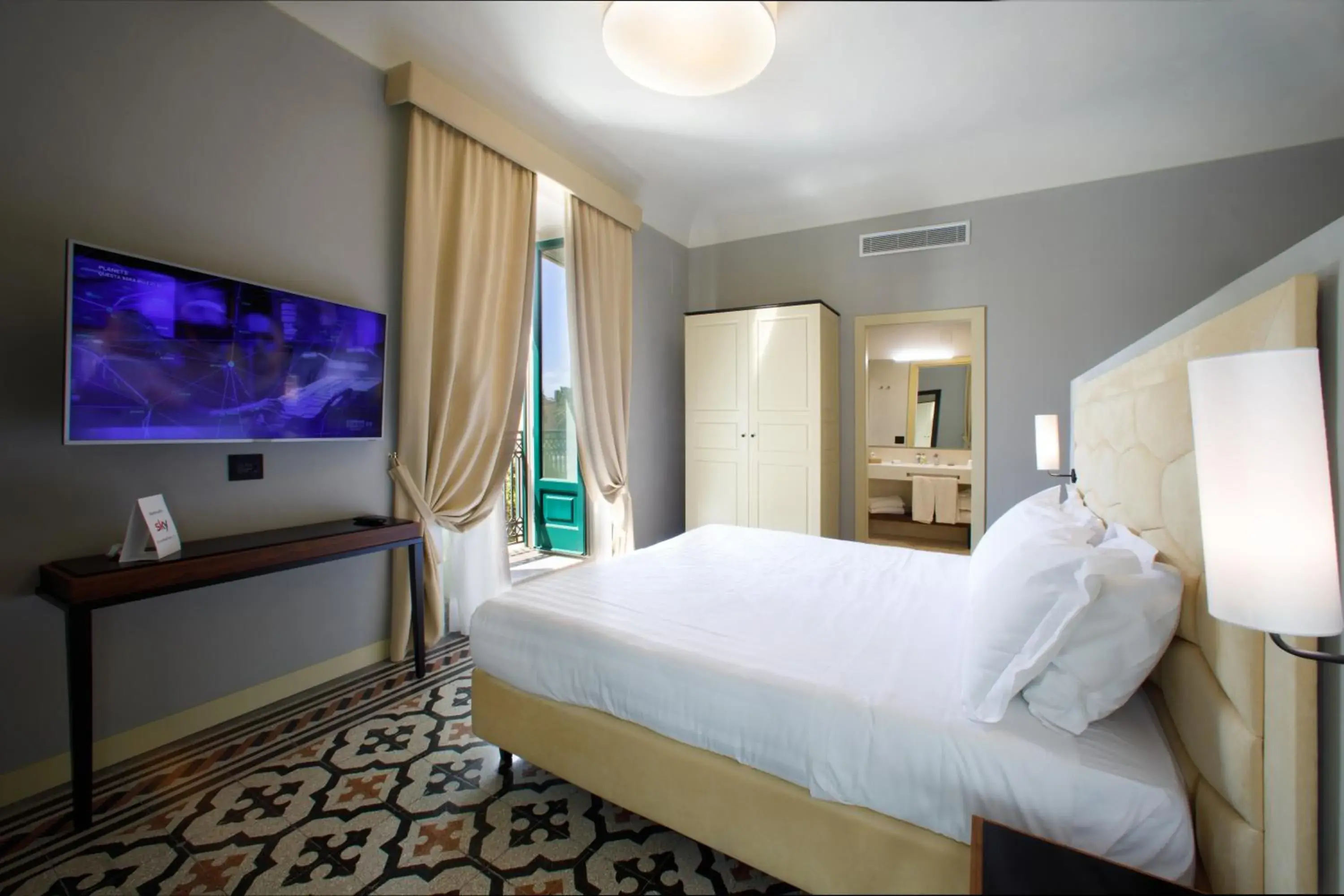 TV and multimedia, Bed in Room Of Andrea Hotel