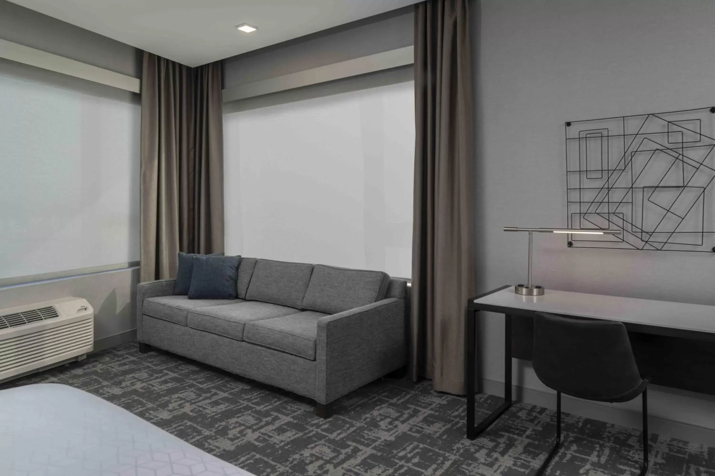 Living room, Seating Area in Staybridge Suites - Boston Logan Airport - Revere, an IHG Hotel
