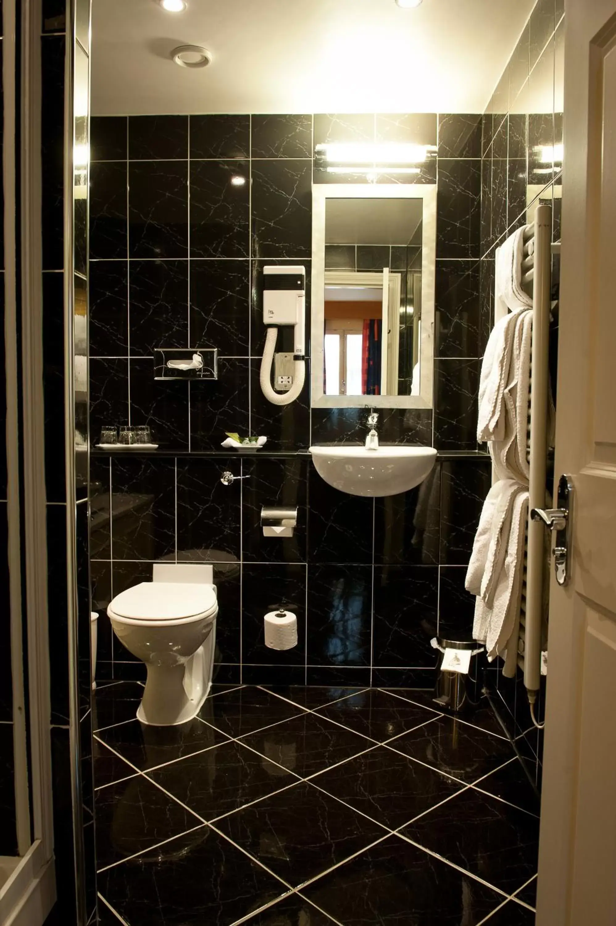 Bathroom in The Bull Hotel; Sure Hotel Collection by Best Western