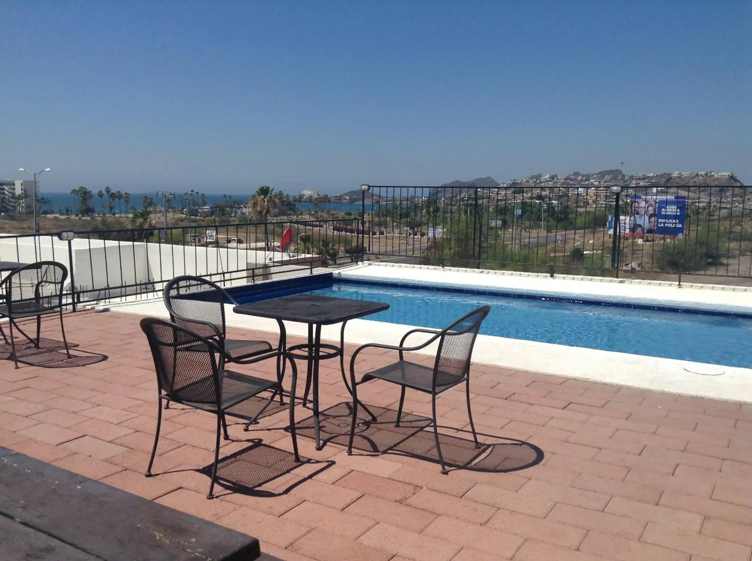 Patio, Swimming Pool in Los Jitos Hotel & Suites