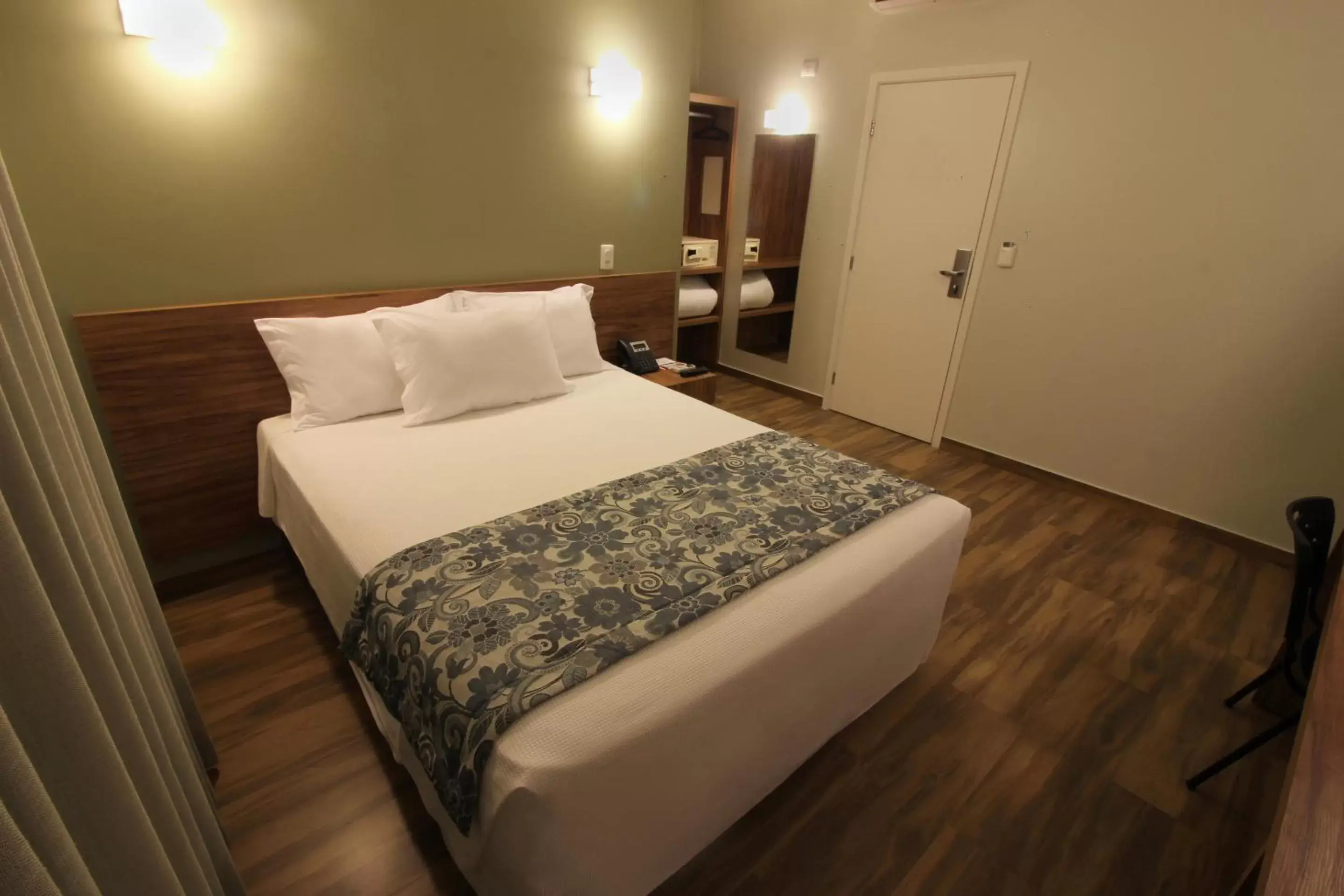 Bed in Impar Suites Barao de Cocais