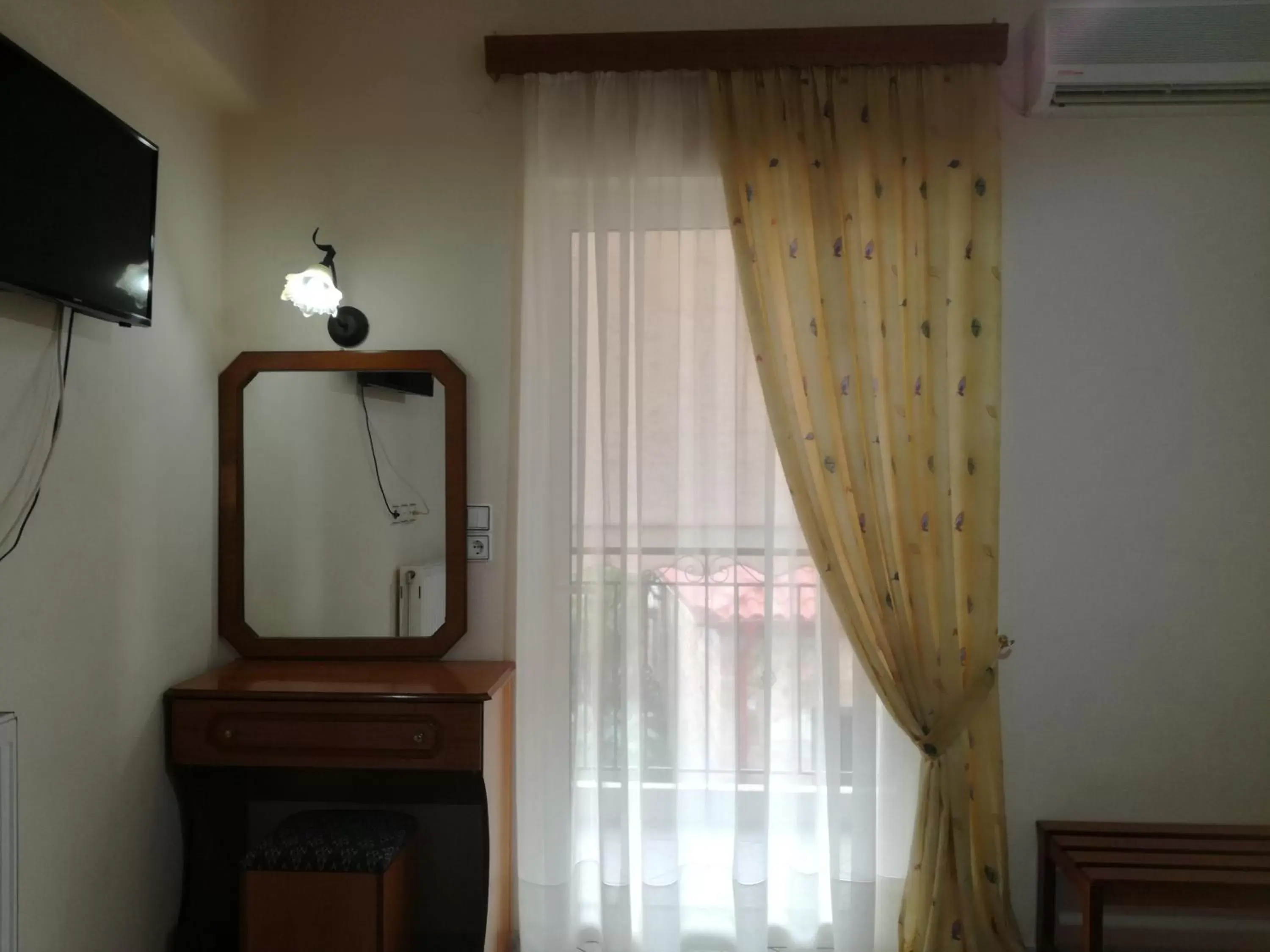 Bedroom, TV/Entertainment Center in Hotel Triantafyllou