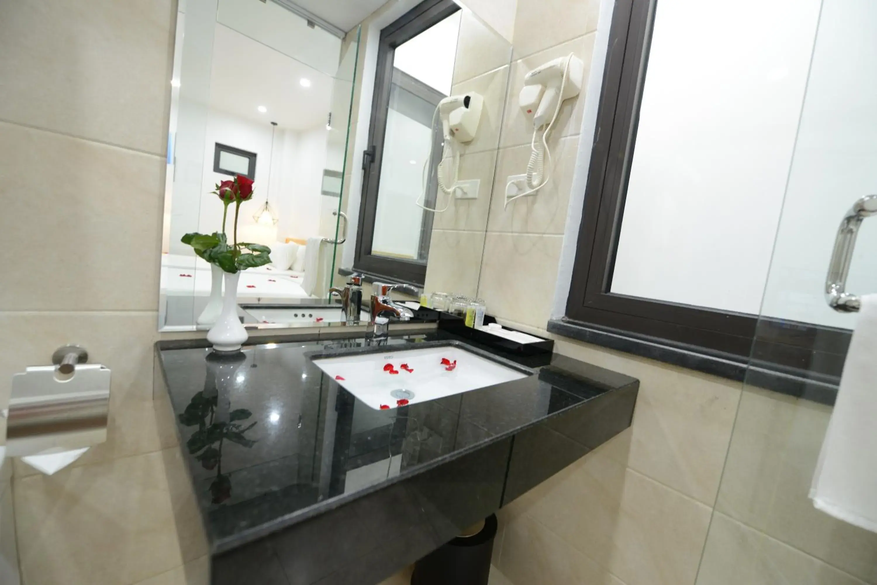 Bathroom in Blue Hanoi Inn City Hotel