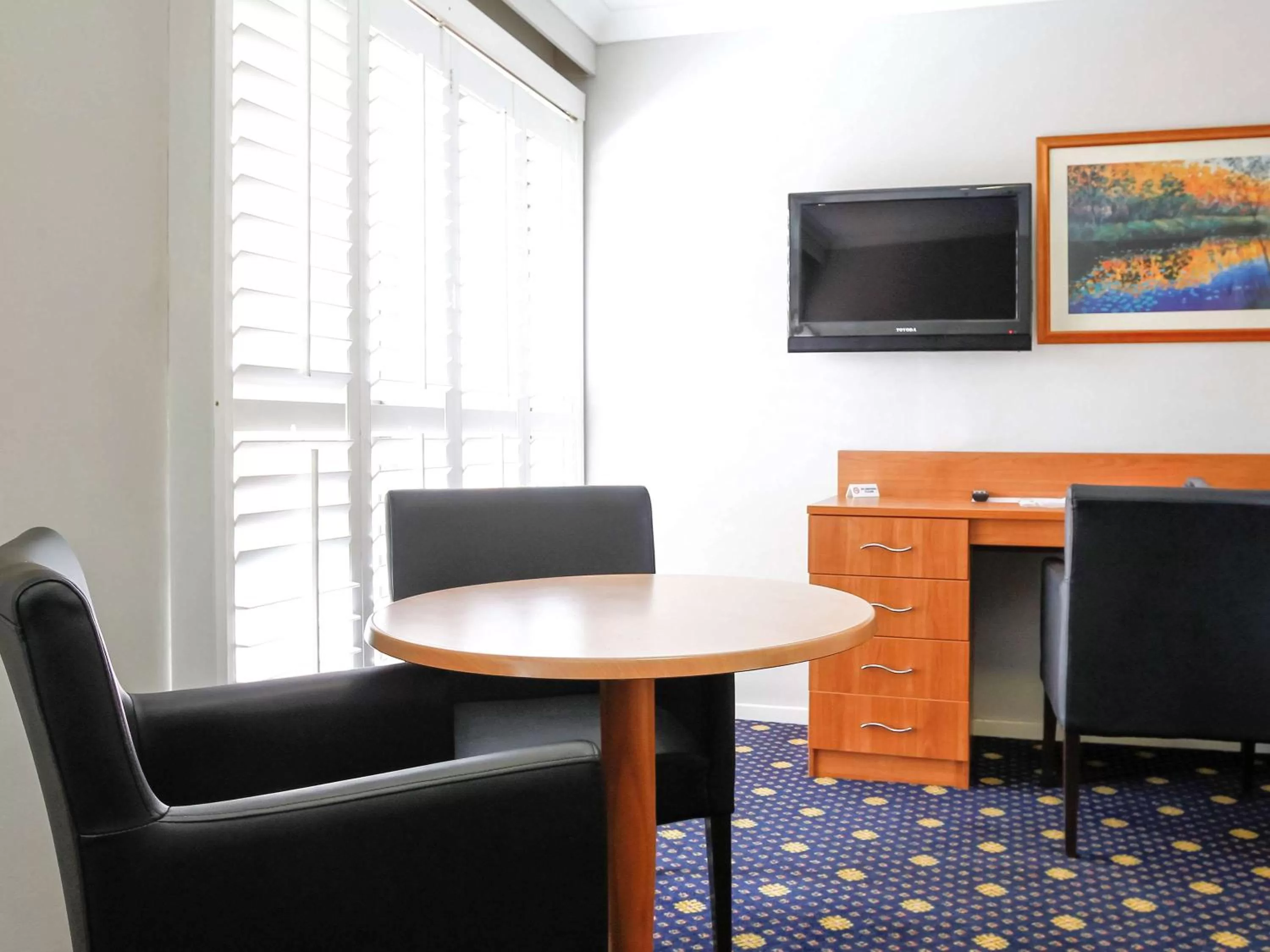 Photo of the whole room in Ramada Hotel & Suites by Wyndham Cabramatta