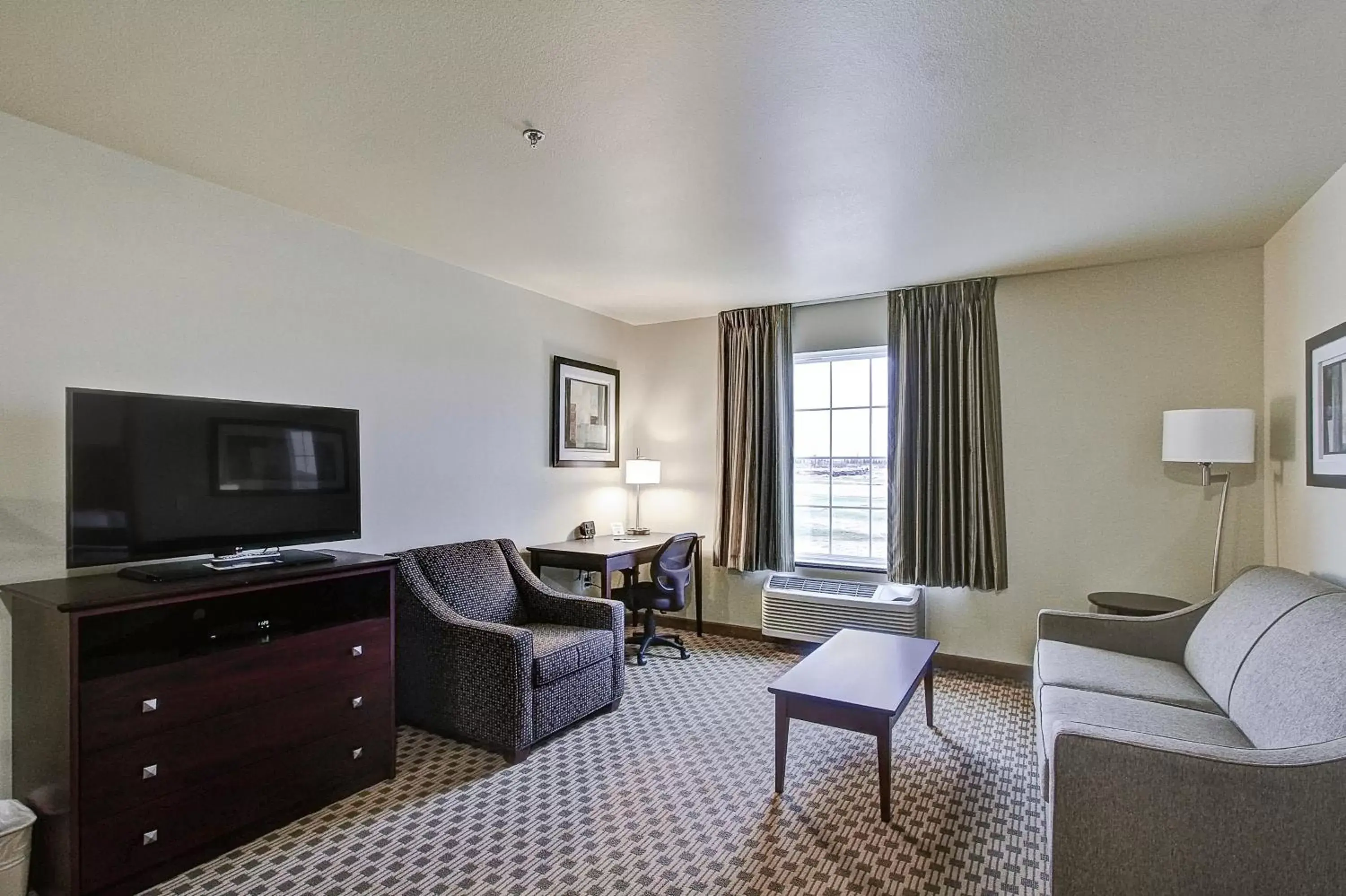 Living room, Seating Area in Cobblestone Hotel & Suites Pulaski/Green Bay