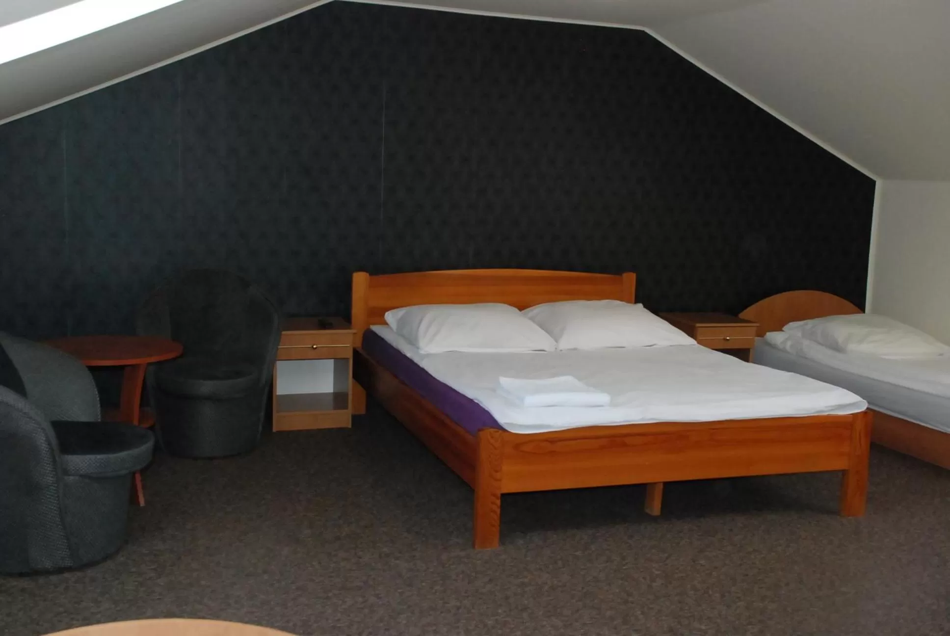 Bed in Hotelik Manhatan