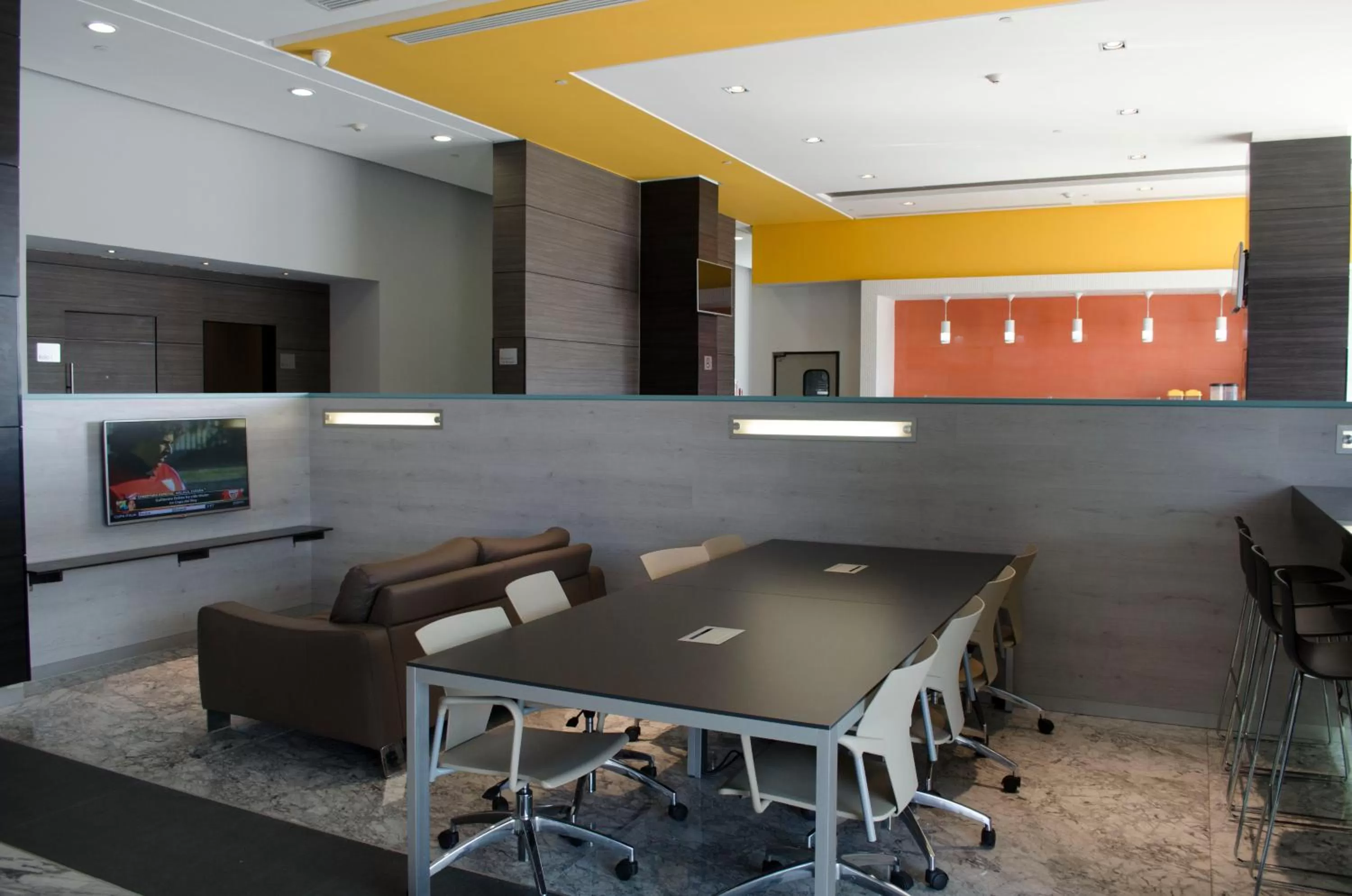 Communal lounge/ TV room in Casa Inn Galerias Celaya