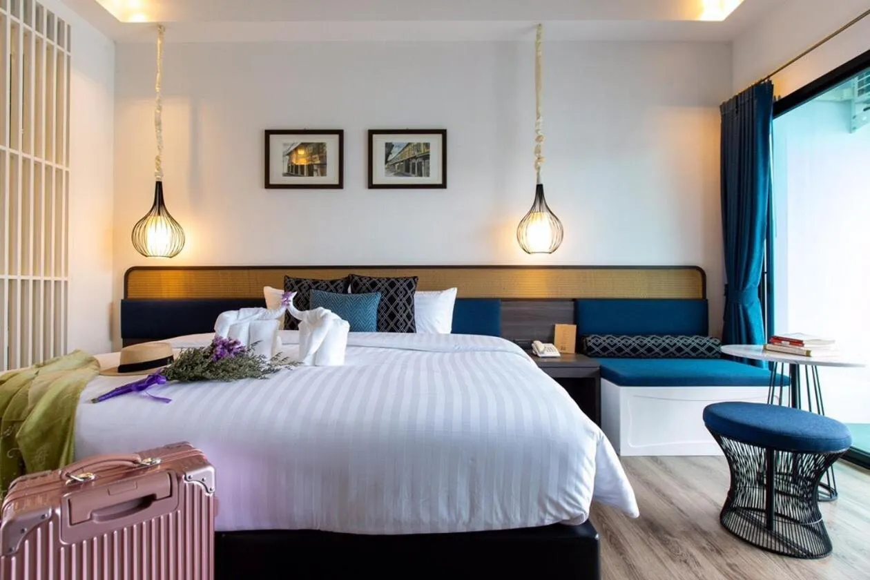 Bed in Chaanburi Boutique Resort